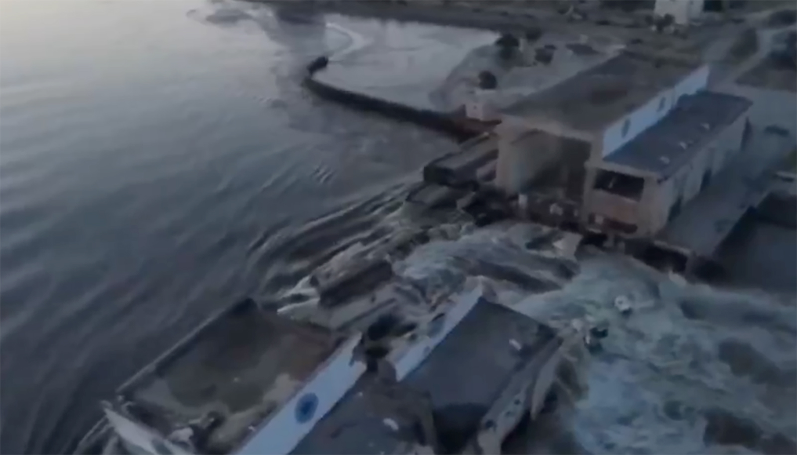 Damage to the Nova Kakhovka dam in southern Ukraine is seen in a screengrab from a social media video.