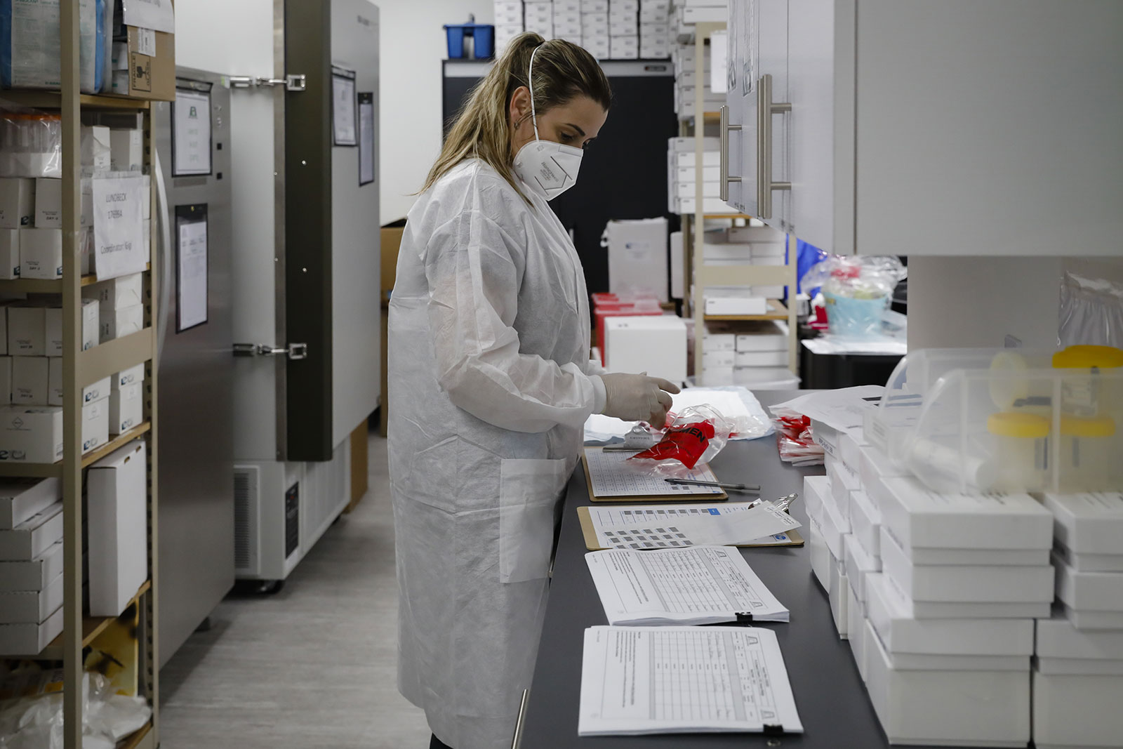 A health worker works in a lab during clinical trials for a Covid-19 vaccine at Research Centers of America in Hollywood, Florida, on September 9.