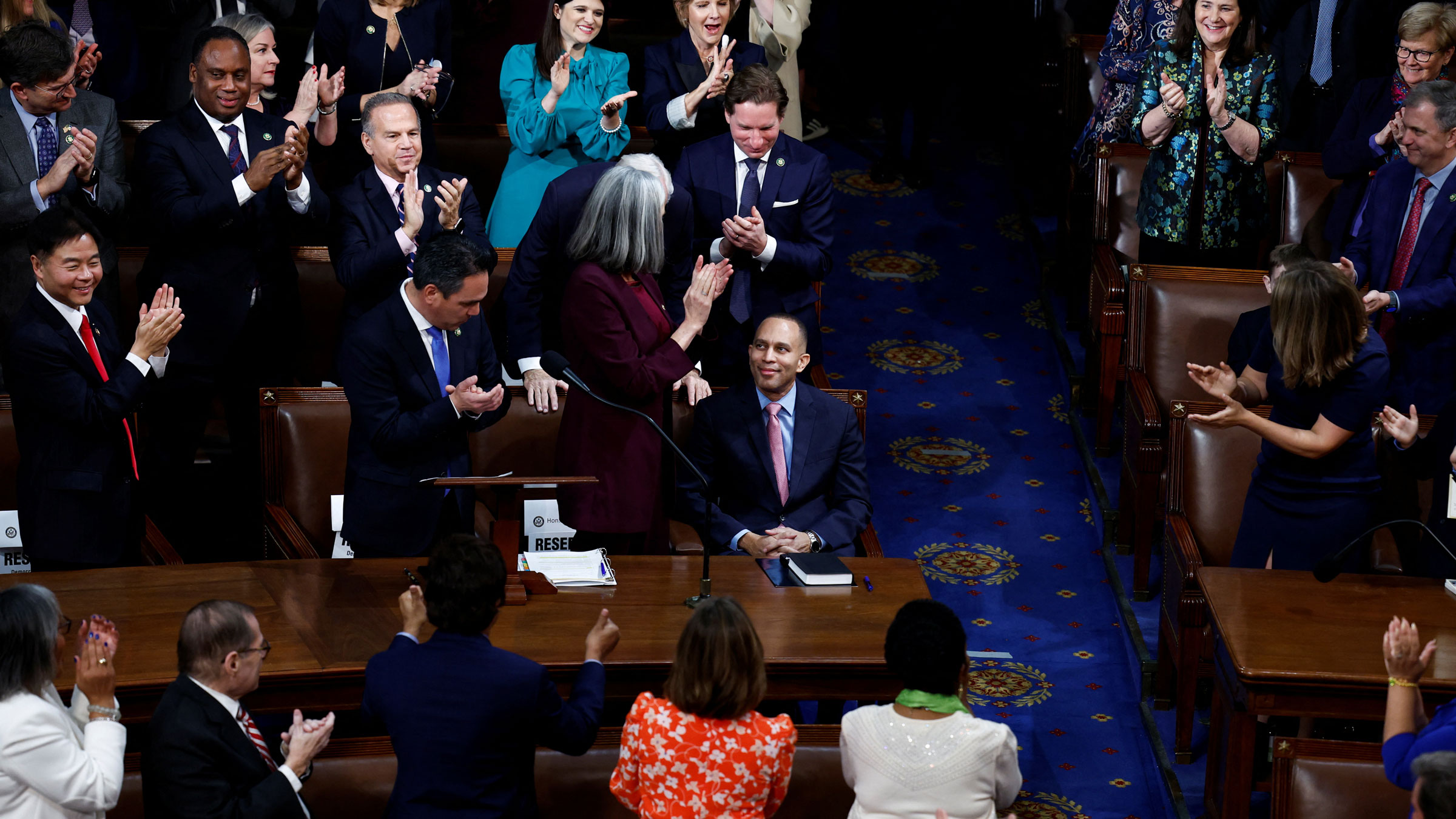 US Rep. Hakeem Jeffries, center, is applauded after he was nominated for House Speaker on Tuesday.