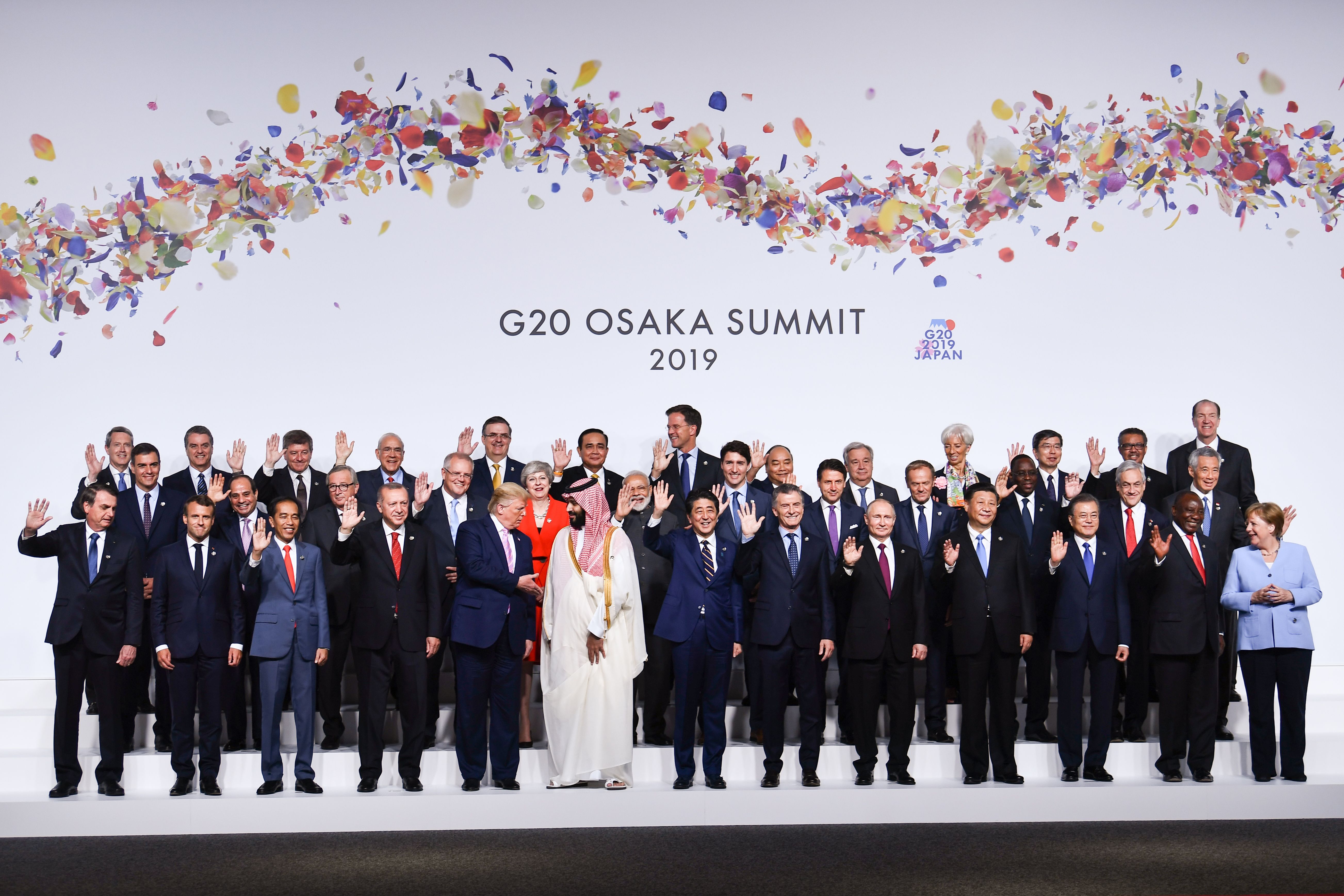 Trump and Mohammed bin Salman talk during the G20 group photo in Osaka, Japan, on Friday, June 28.
