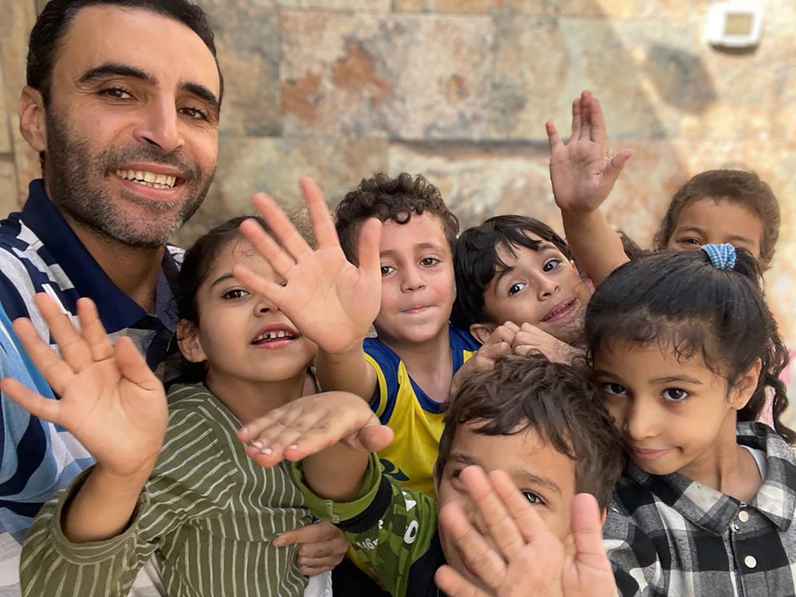 Hazem Saeed Al-Naizi and children