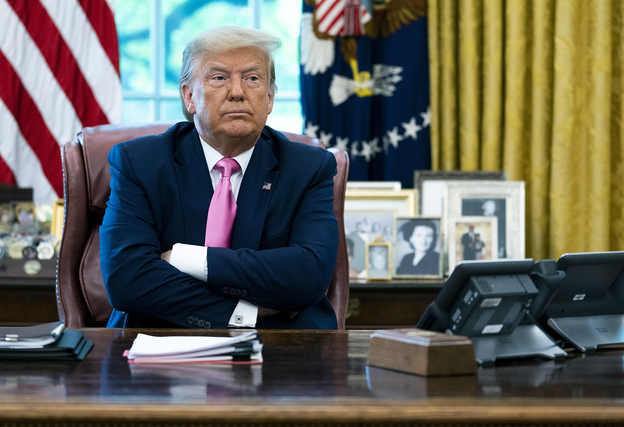 U.S. President Donald Trump talks to reporters at the White House on July 20, in Washington, DC.