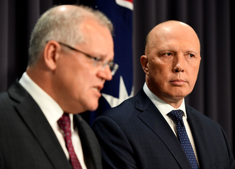 Prime Minister Scott Morrison, left, and Home Affairs Minister Peter Dutton, right, hold a news conference at Parliament House on December 02, 2019 in Canberra, Australia. 