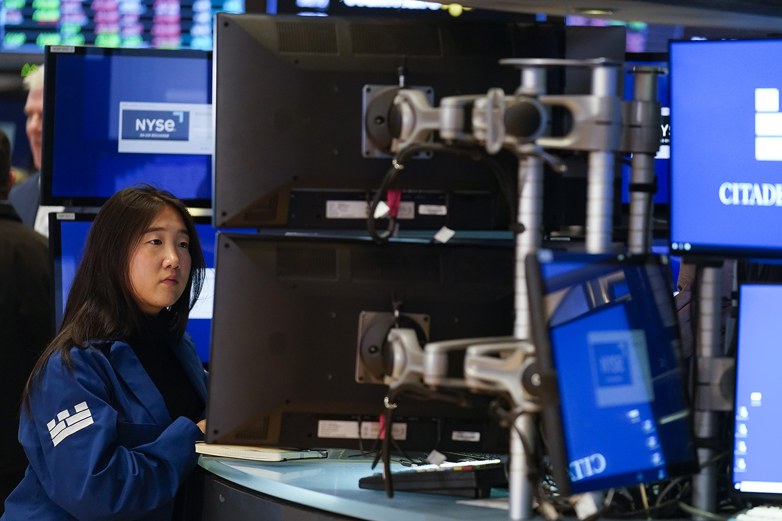 Traders work on the floor at the New York Stock Exchange on Monday, Nov. 28.