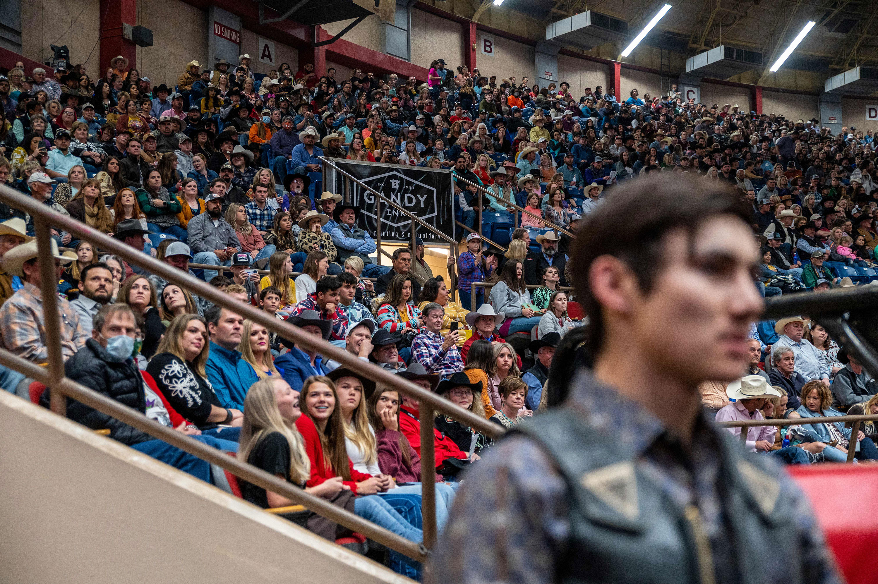 A crowd looks on during the San Angelo Stock Show and Rodeo in San Angelo, Texas, on April 16.