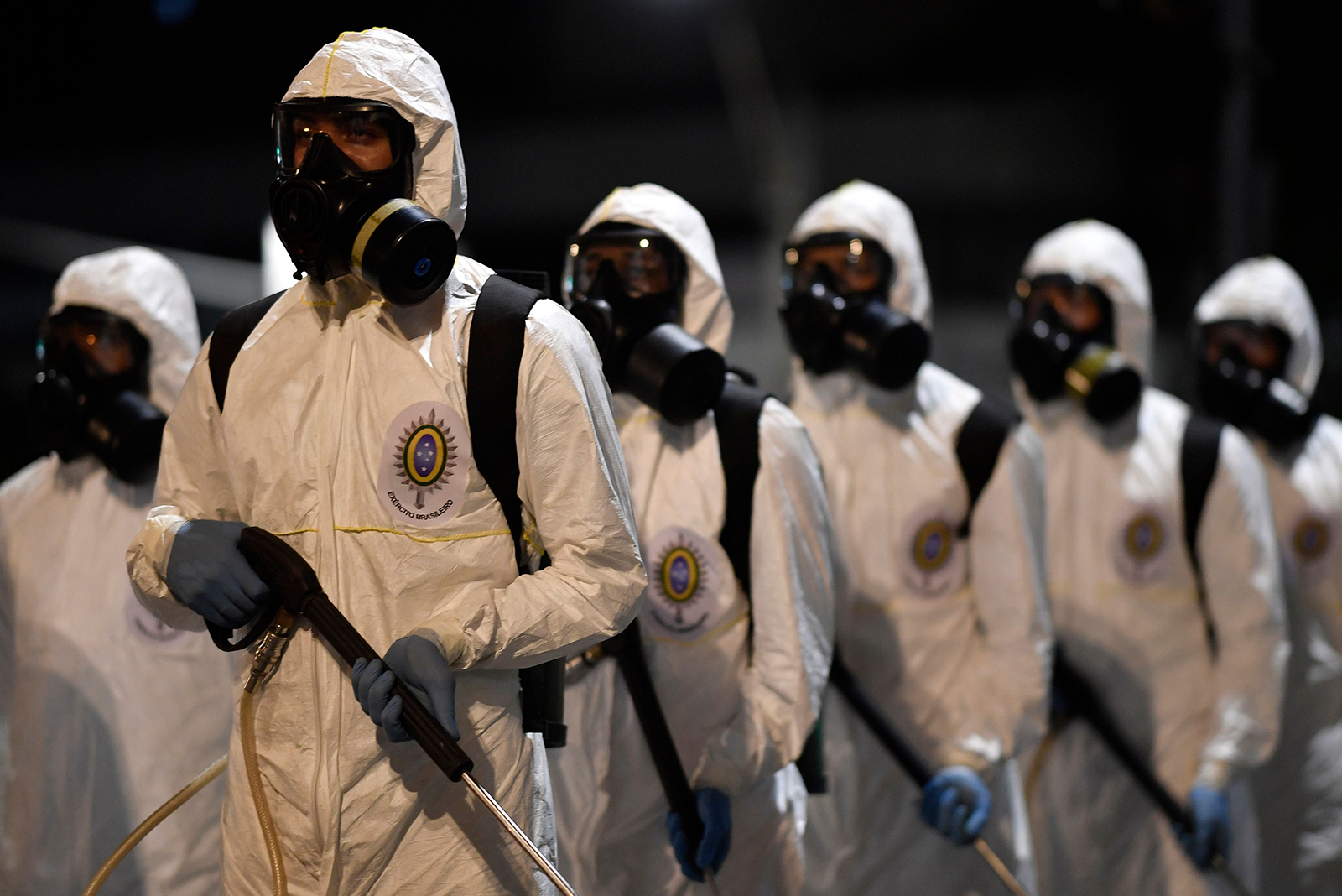 Soldiers from the 4th Military Region of the Brazilian Armed Forces take part in the cleaning and disinfection of the Municipal Market in the Belo Horizonte, Brazil on August 18. 