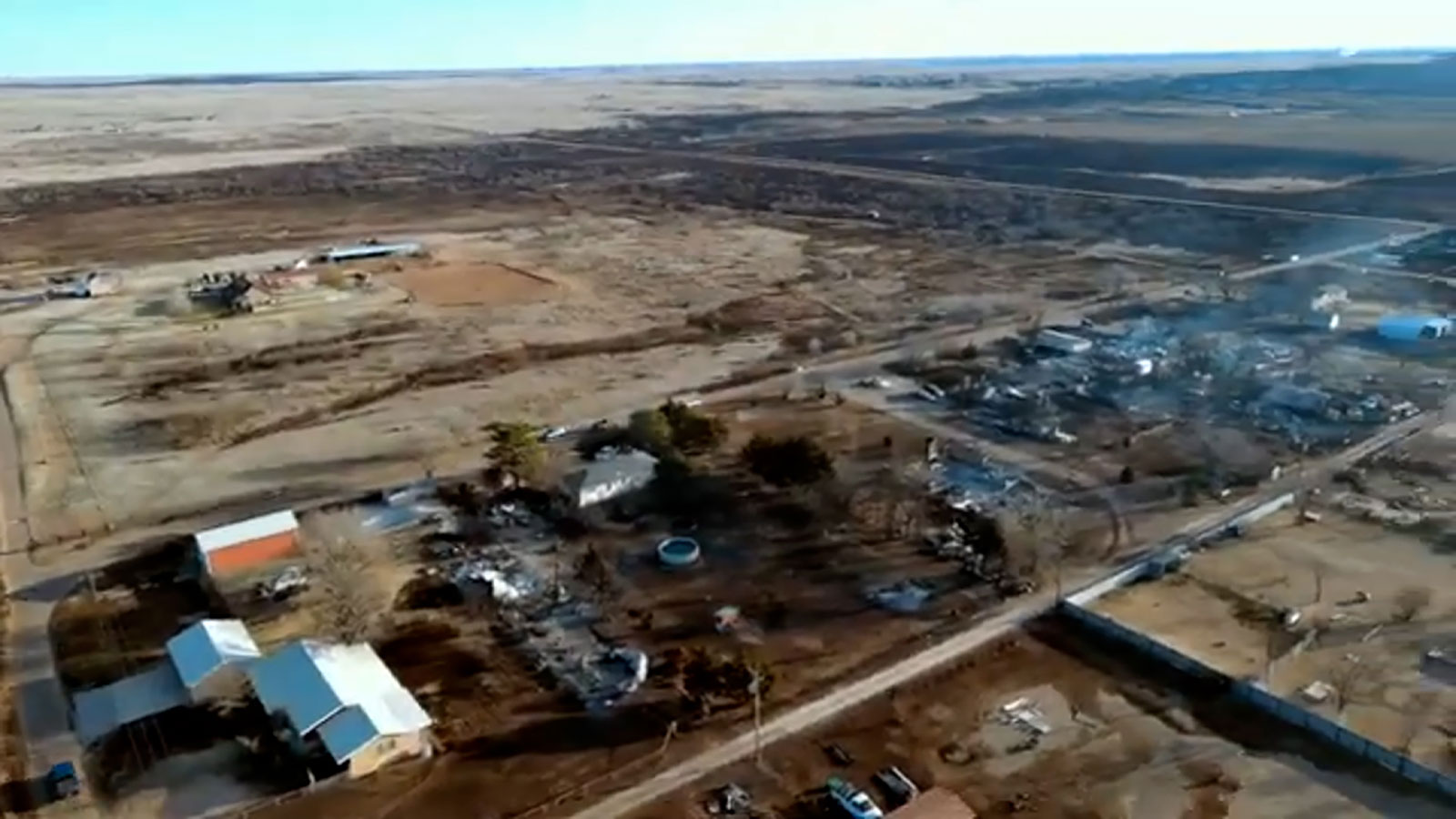 Drone footage taken by Allen Garland shows damaged structures in Stinnett, Texas.