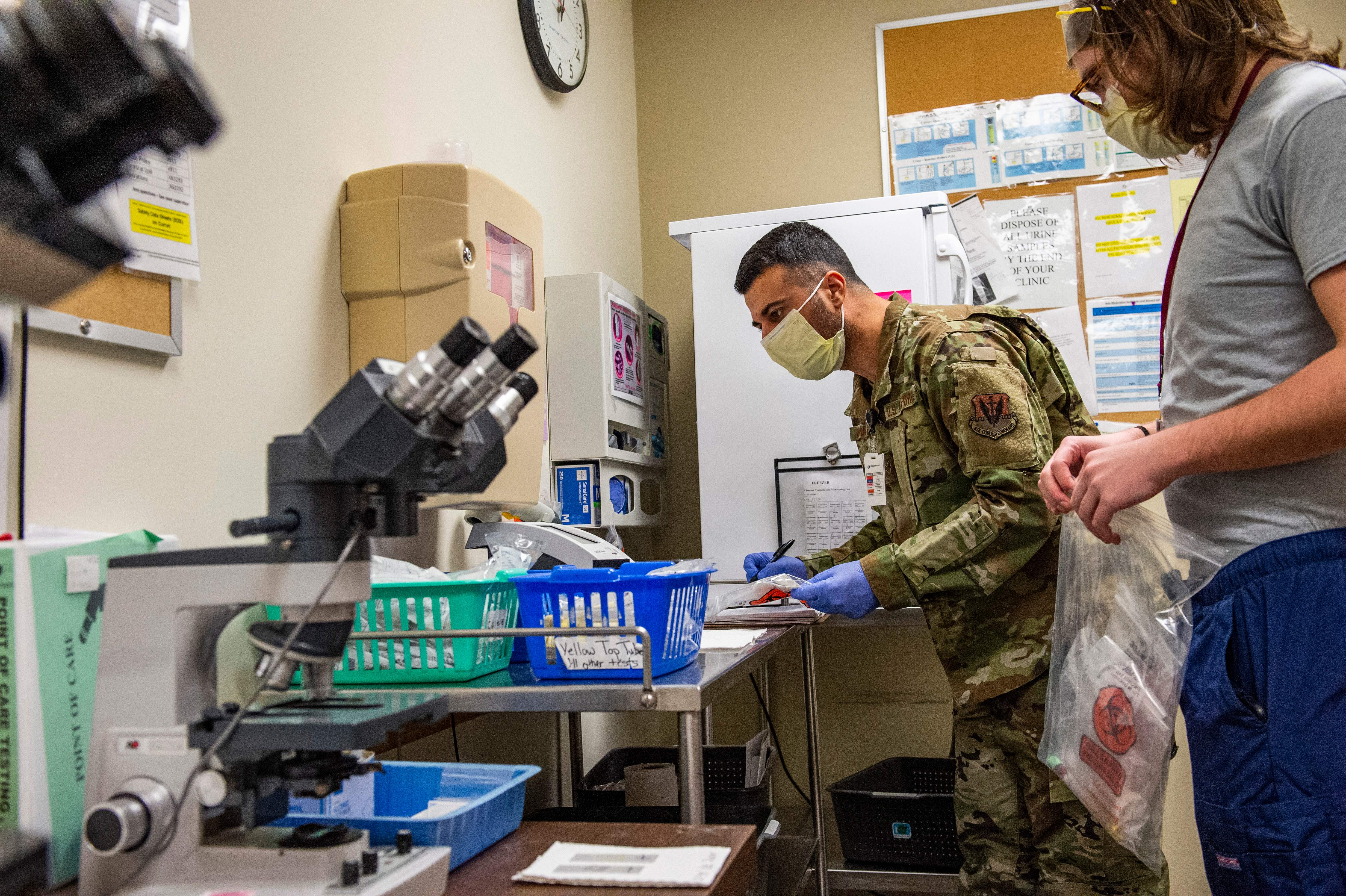 A National Guard airman is trained in hospital procedures at UMass Memorial Medical Center in Worcester, Massachusetts last month. The Massachusetts National Guard activated soldiers and airmen to help address the medical worker shortage. 