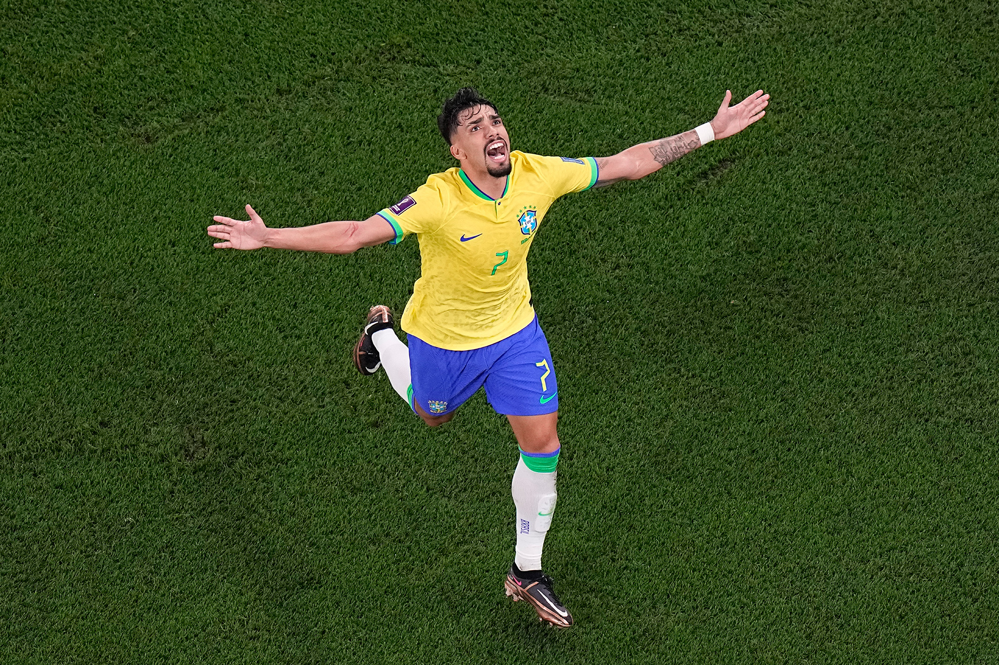 Lucas Paqueta celebrates scoring Brazil's fourth goal.