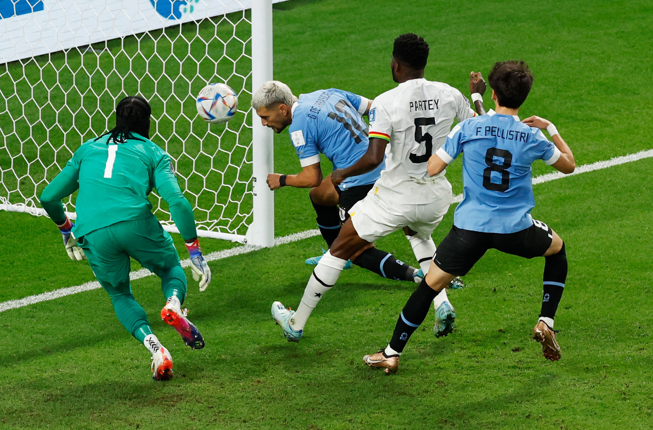 Uruguay's Giorgian de Arrascaeta scores his team's first goal against Ghana on Friday.