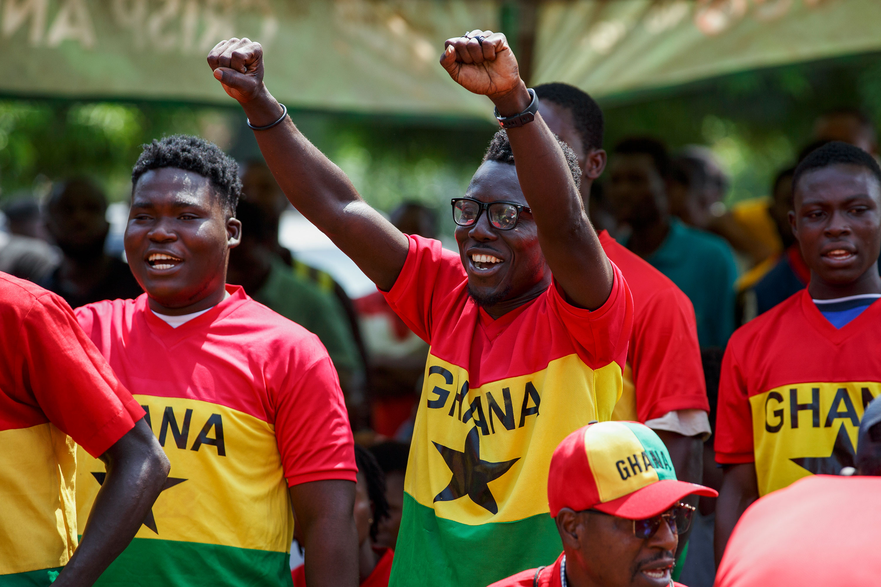 Fans cheer as they watch the match in Accra, Ghana, on Monday.