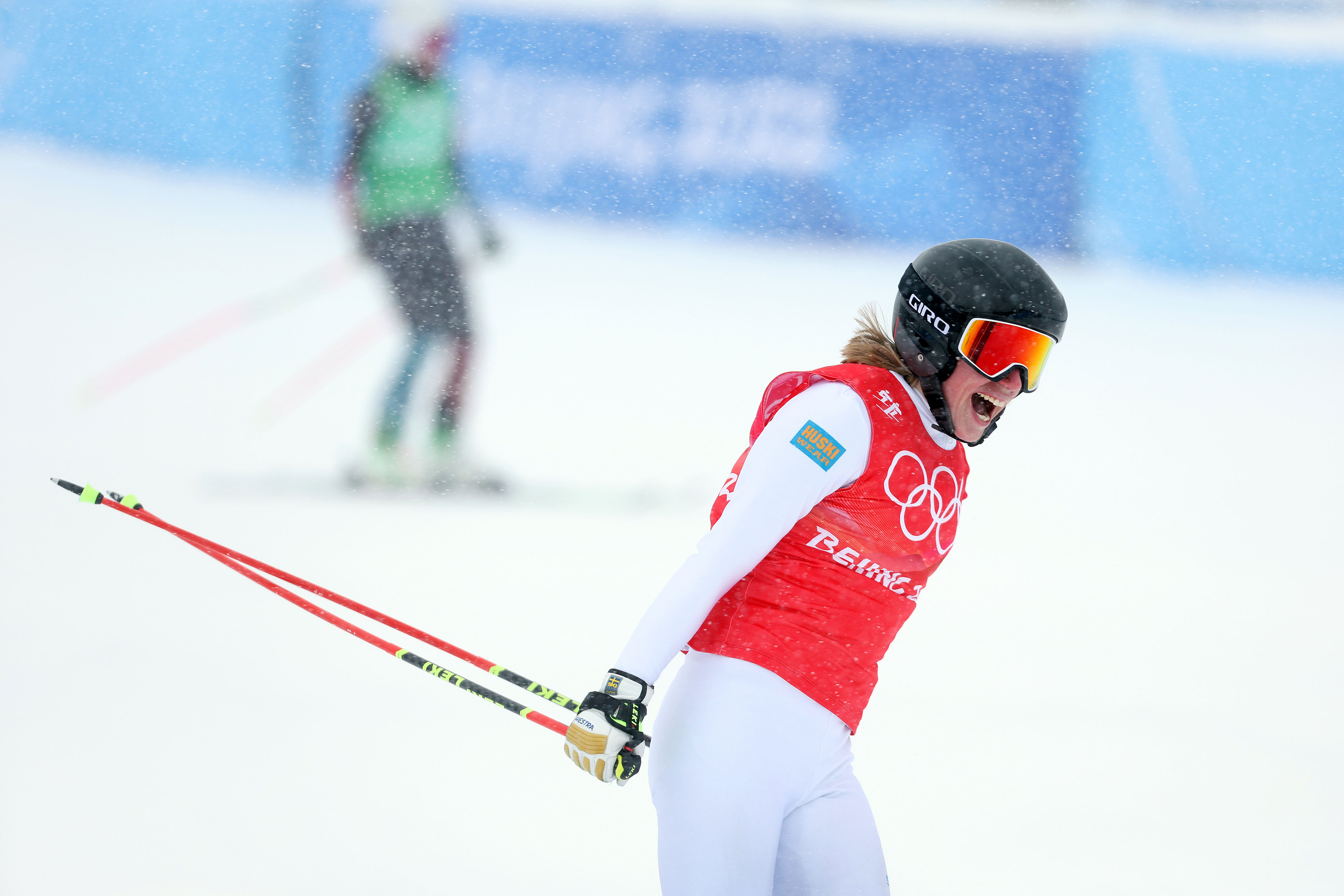 Sandra Näslund celebrates after winning the gold medal at the women's freestyle skiing ski cross big final on Tuesday.