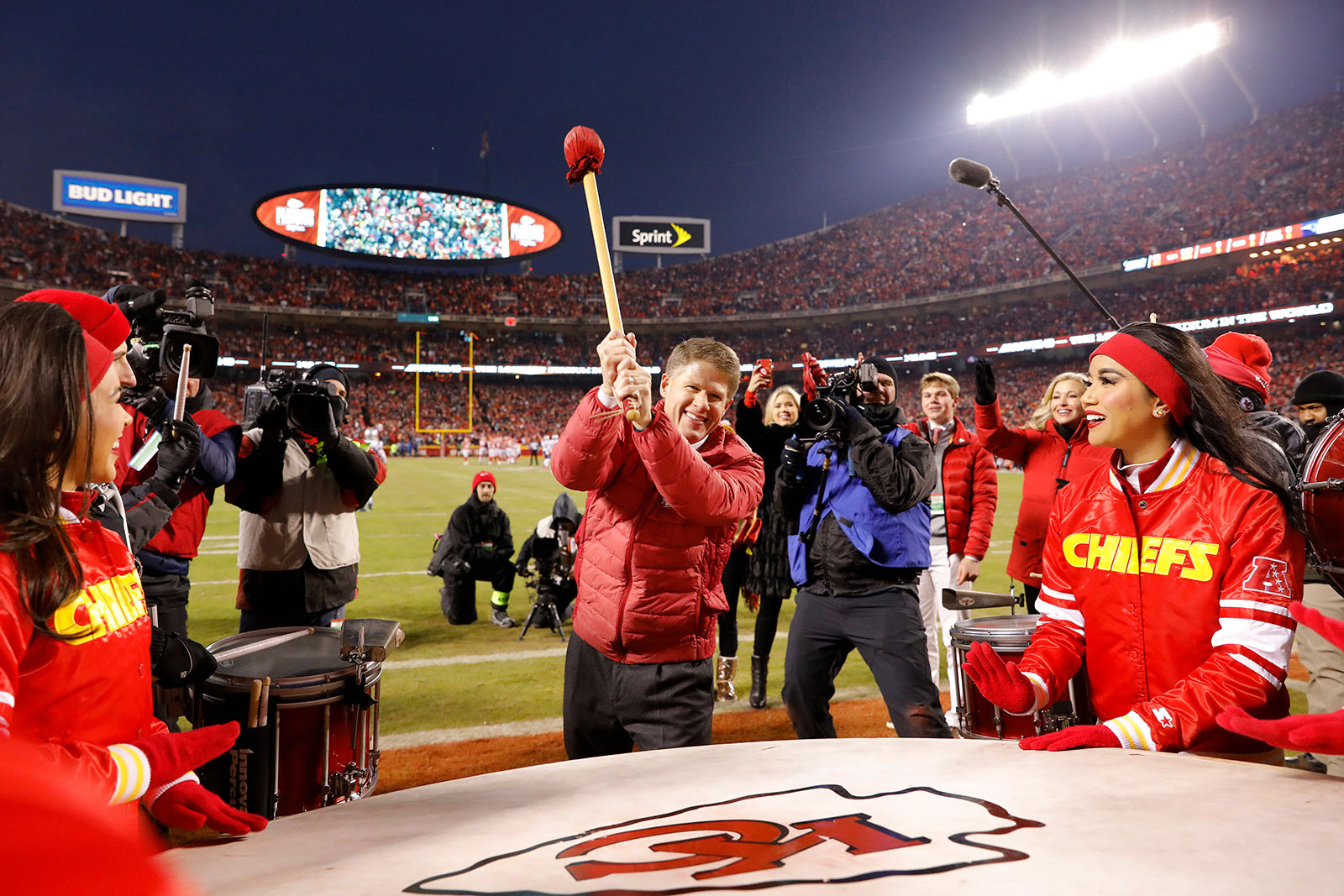 Kansas City Chiefs owner Clark Hunt bangs the drum before the AFC Championship Game against the New England Patriots on January 20, 2019.