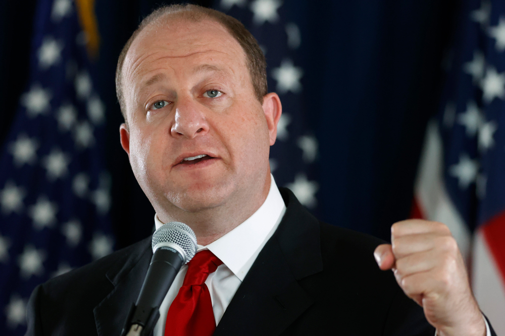 Colorado Gov. Jared Polis speaks during a news conference in Denver on Thursday, May 28.