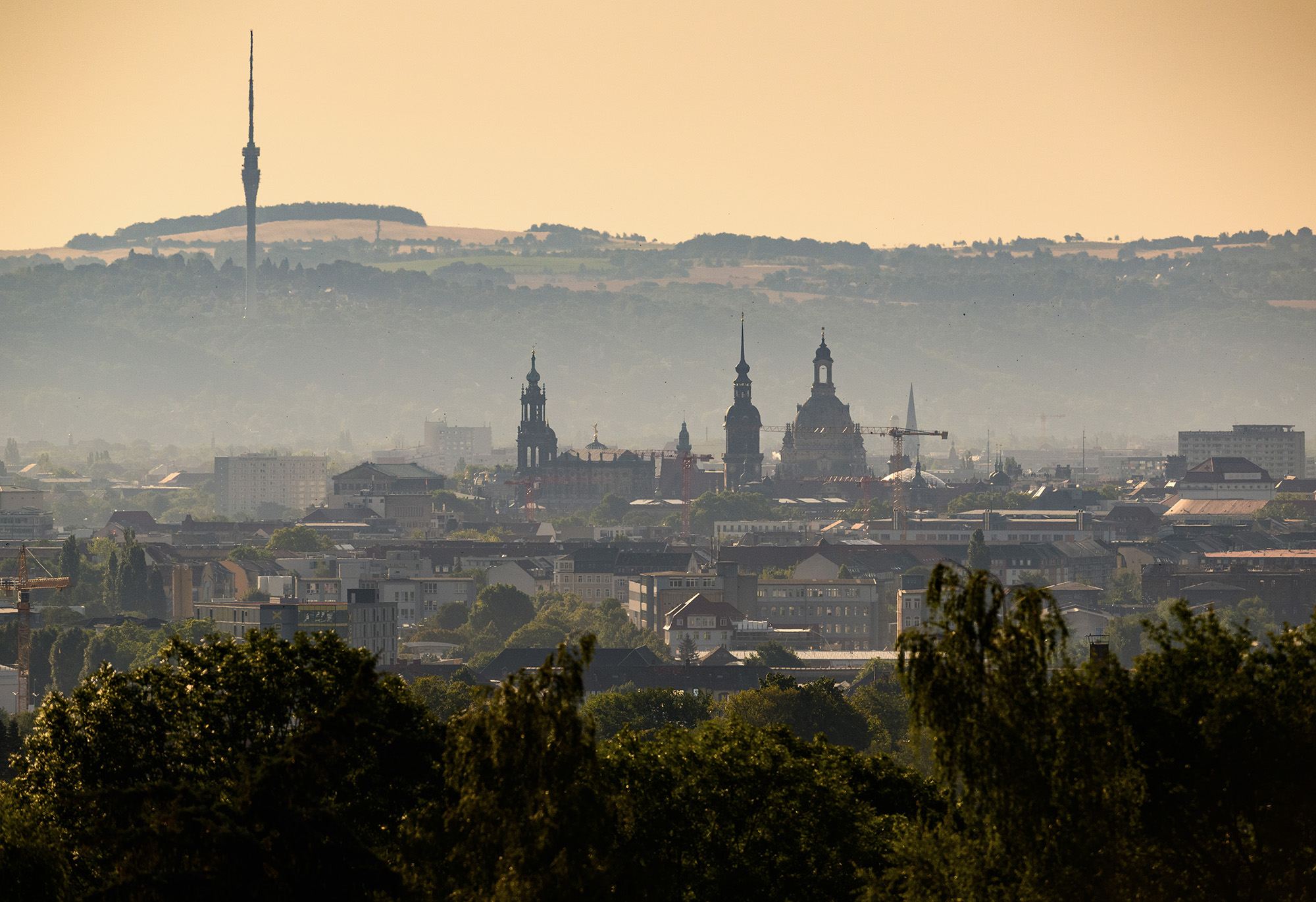 View of the old town in Dresden, Germany, in the haze of the morning sun on July 19.
