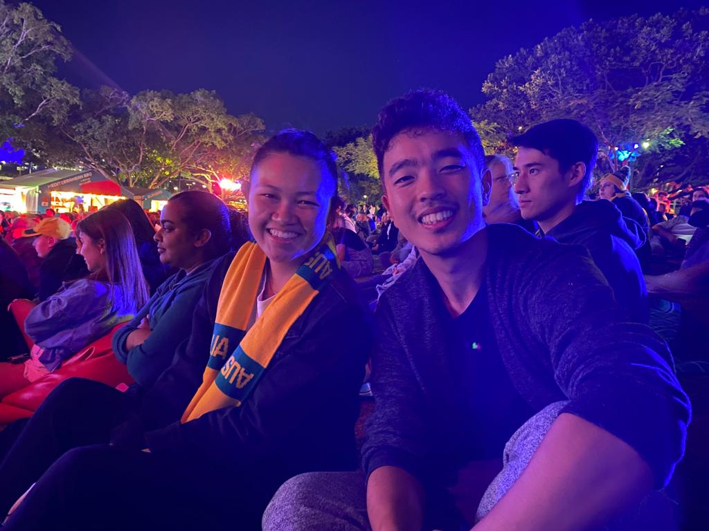 Christina Hu (left) and Brandon Law (right) in the Brisbane fanzone for the Australia vs. Canada game at the Women's World Cup. 
