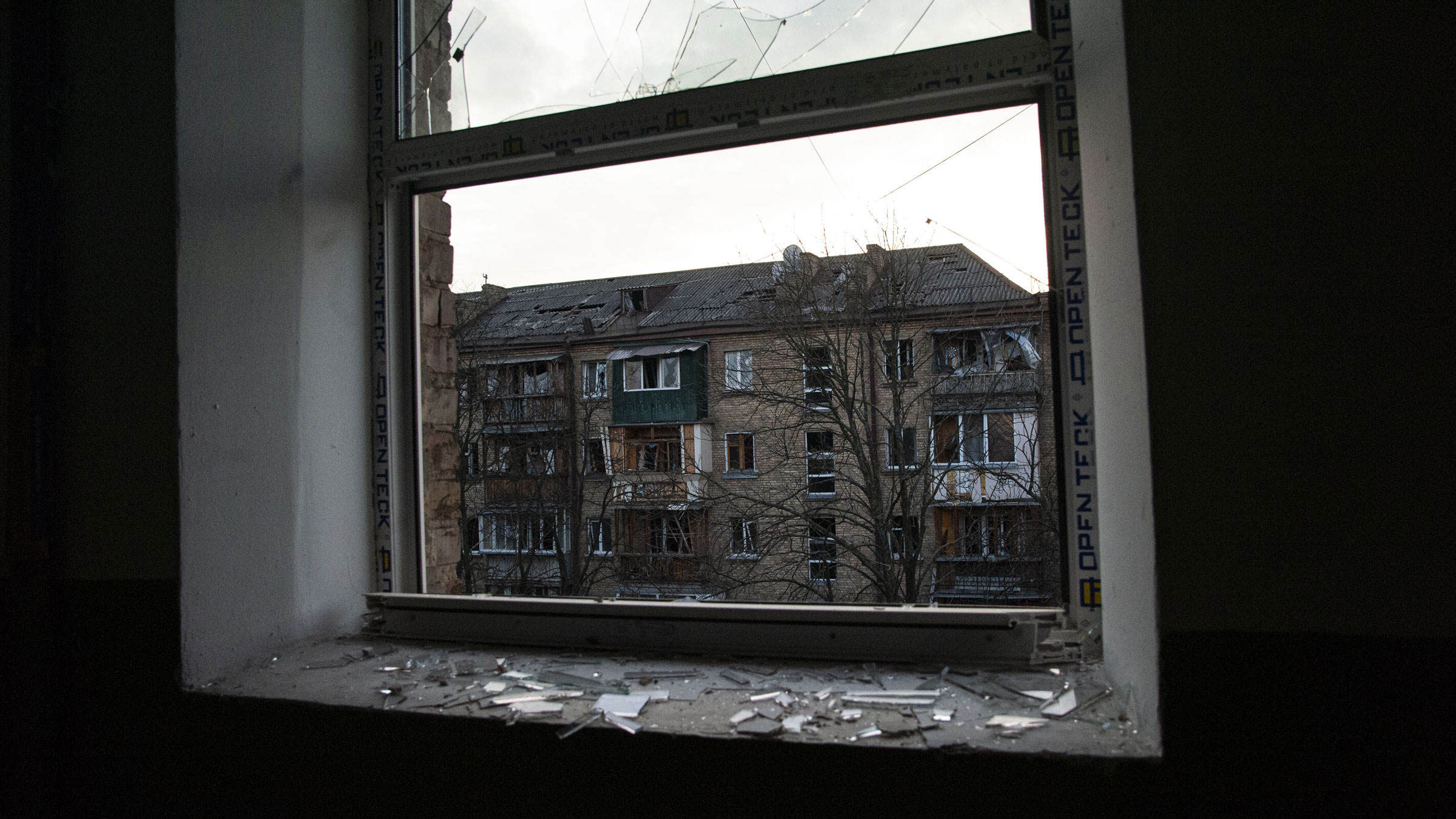 A window view from a damaged building in Kyiv, Ukraine, on Saturday.