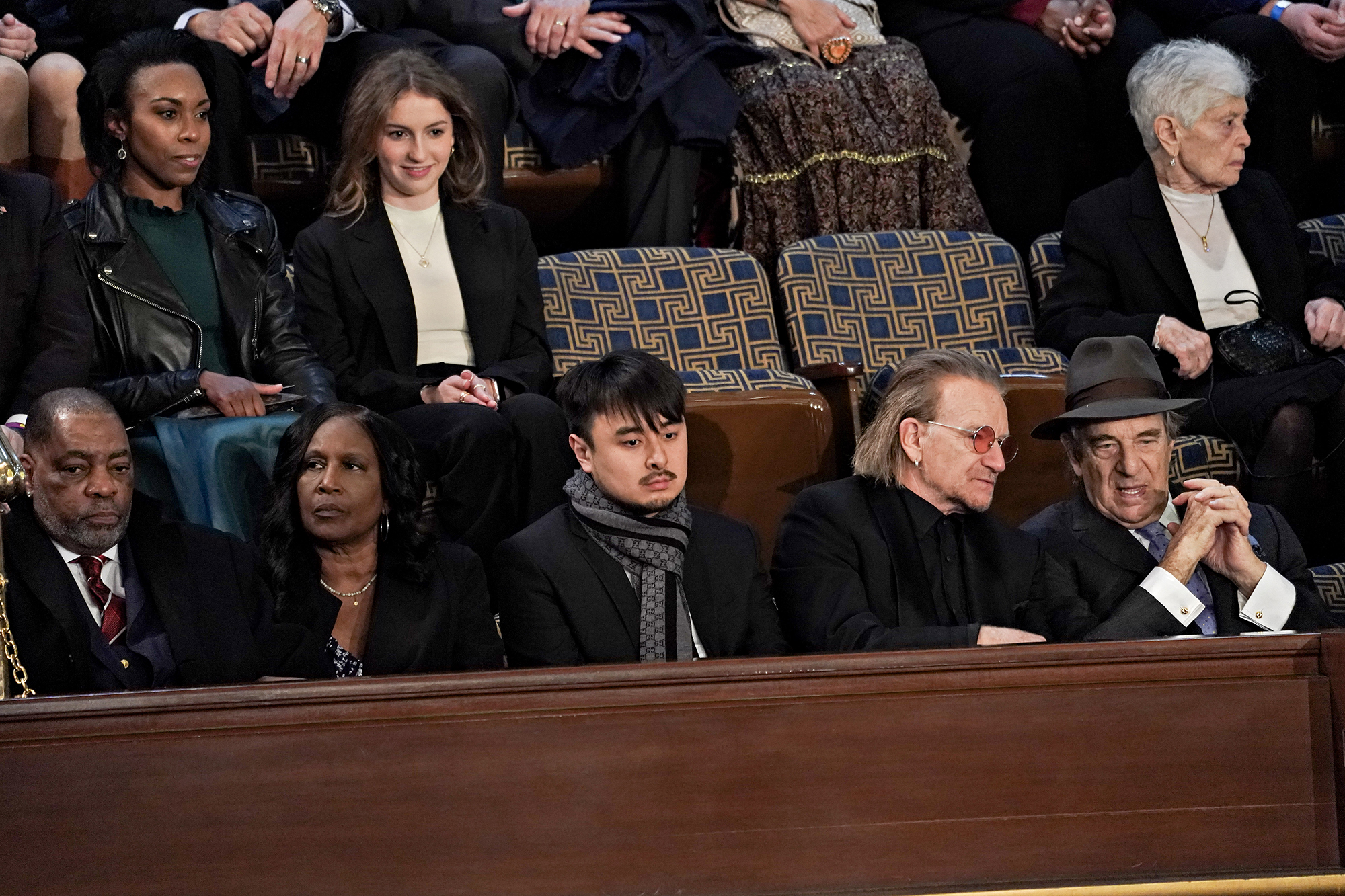 Paul Pelosi, husband of Representative Nancy Pelosi, a Democrat from California, from right, musician Bono, Brandon Tsay, who disarmed the shooter responsible for the mass shooting at the Monterey Park Lunar New Year celebrations, and RowVaughn Wells and Rodney Wells, mother and stepfather of Tyre Nichols, a Black man who was fatally beaten by Memphis, Tennessee, police officers, ahead of a State of the Union address.