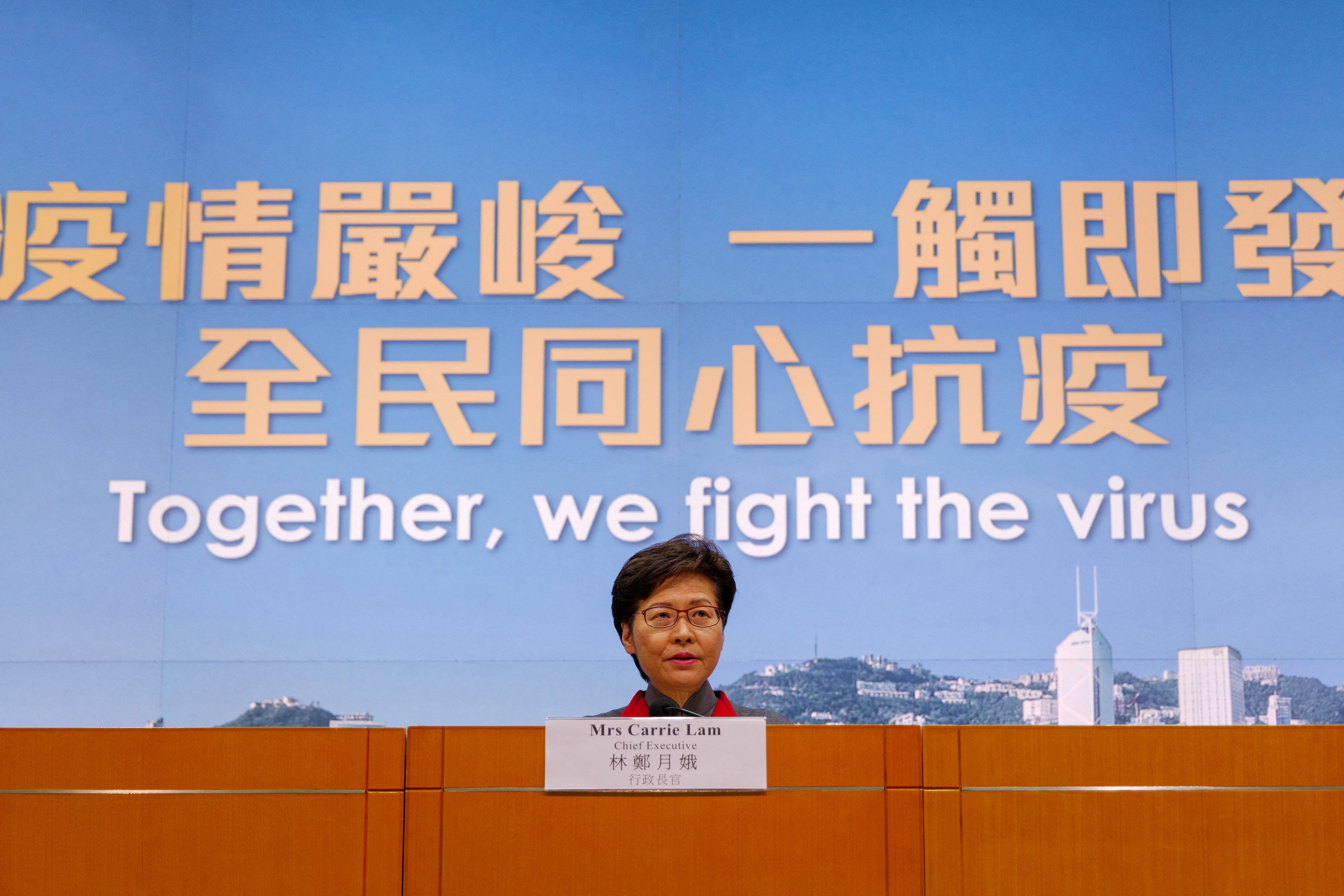 Hong Kong's Chief Executive Carrie Lam holds a press conference as her government announces strict new anti-coronavirus controls in Hong Kong on January 5, 2022. 