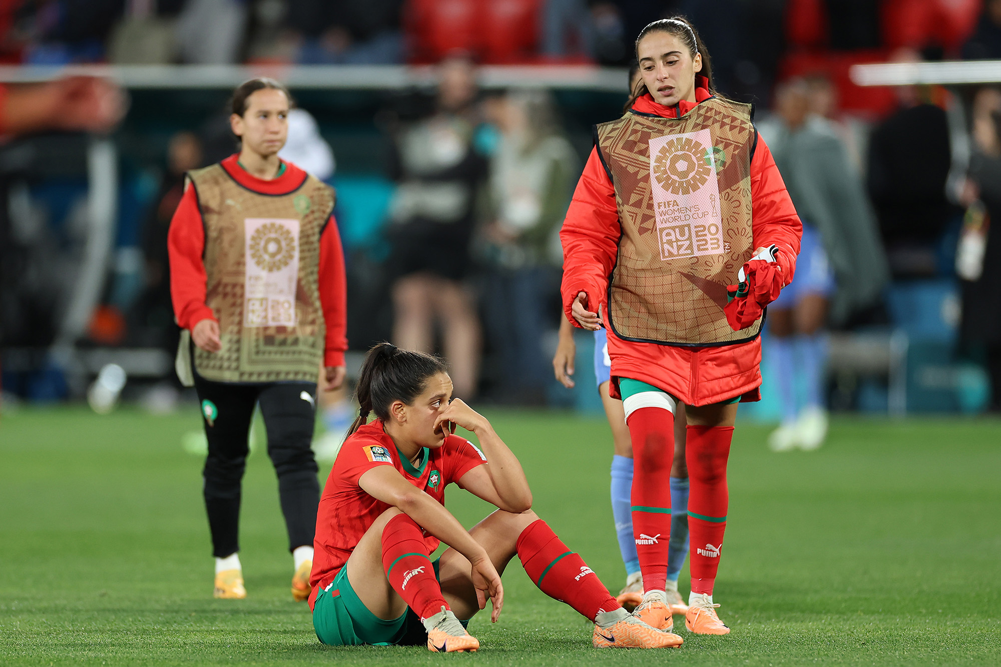 A dejected Sakina Ouzraoui reacts after Morocco's 4-0 defeat against France at the Women's World Cup. 