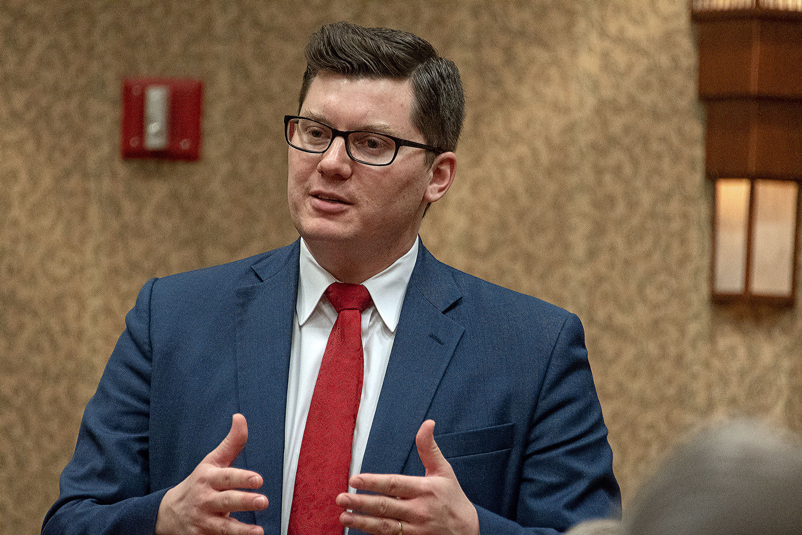 Jake LaTurner talks with members of the 2nd congressional district during a meeting at the annual GOP convention in Topeka, Kansas on February 16, 2019.