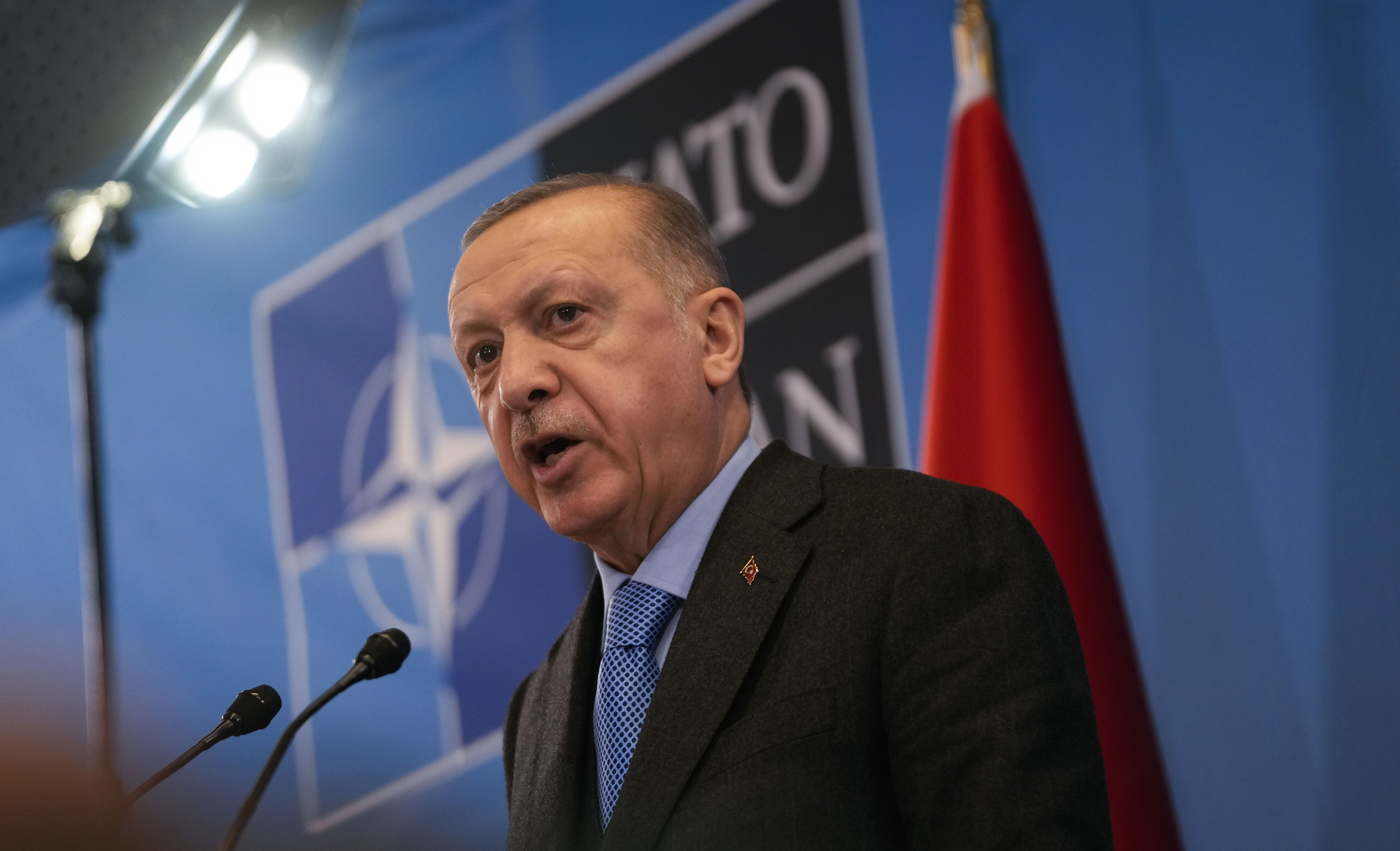 Turkish President Recep Tayyip Erdogan speaks during a news conference after an extraordinary NATO summit at the alliance's headquarters in Brussels, Belgium, on March 24.