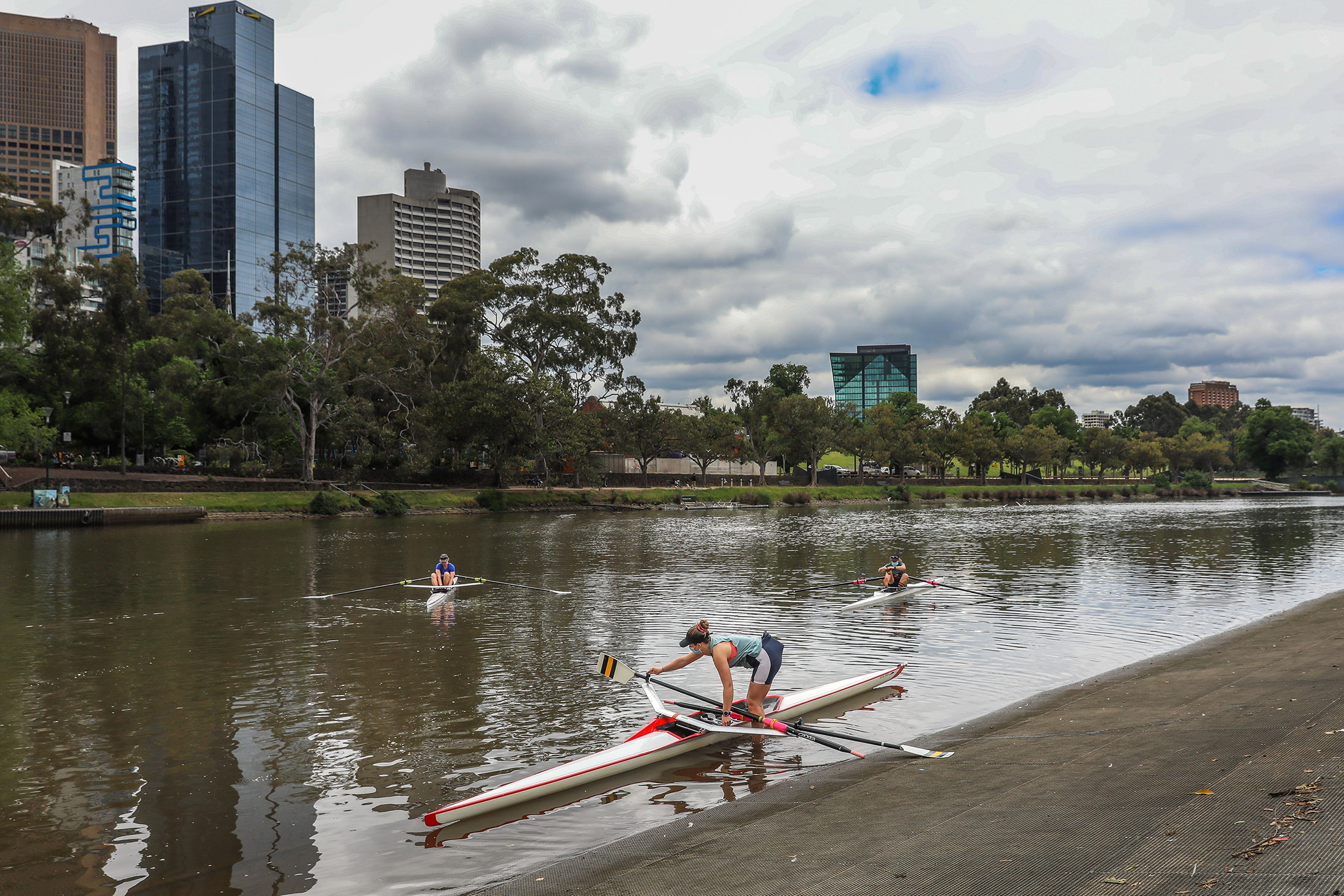 Rowers are seen about to leave the banks of the Yarra river as they go rowing on November 6, in Melbourne, Australia.  