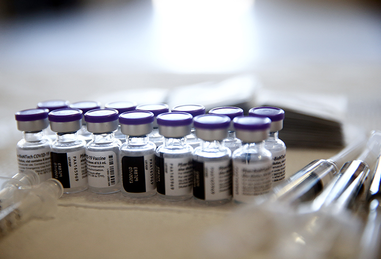 Vials containing doses of the Pfizer COVID-19 vaccine are viewed at a clinic on April 9, 2021 in Los Angeles, California. 