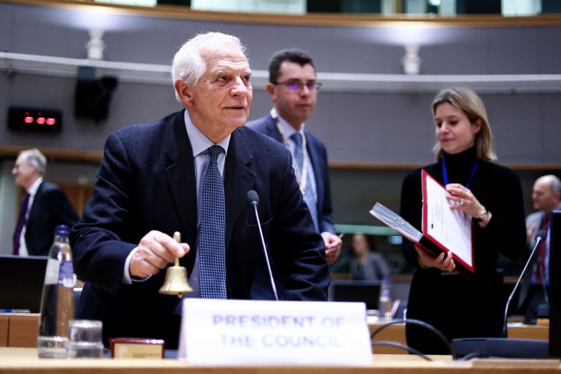 The European Commission's High Representative for Foreign Affairs and Security Policy Josep Borrell rings the bell before a meeting of Foreign Affairs Council at the EU headquarters in Brussels on February 20.