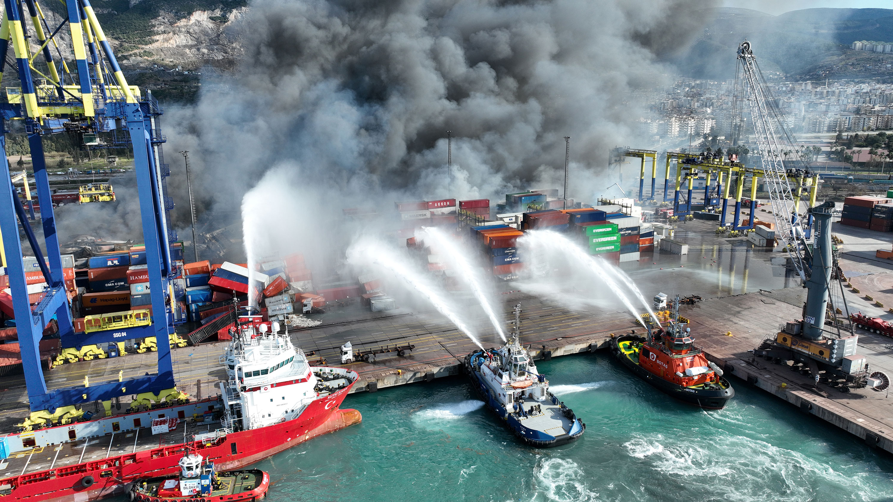 Firefighting ships attempt to extinguish the fire on Wednesday.
