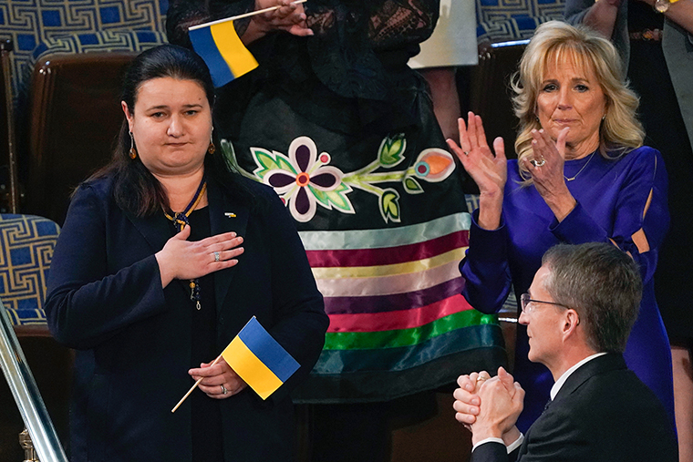 Ukraine Ambassador to the United States, Oksana Markarova, acknowledges President Joe Biden as first lady Jill Biden applauds.