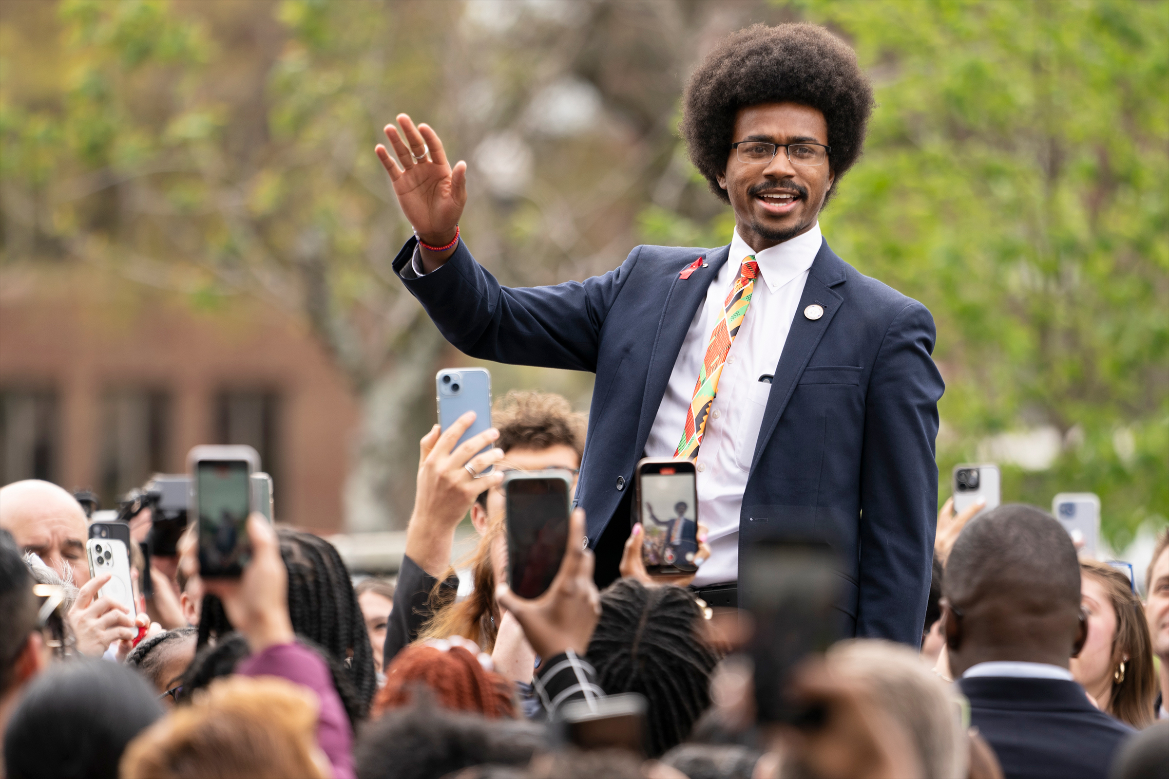 Expelled Rep. Justin Pearson waves, Friday, April 7, 2023, in Nashville, the day after he and Rep. Justin Jones were expelled.
