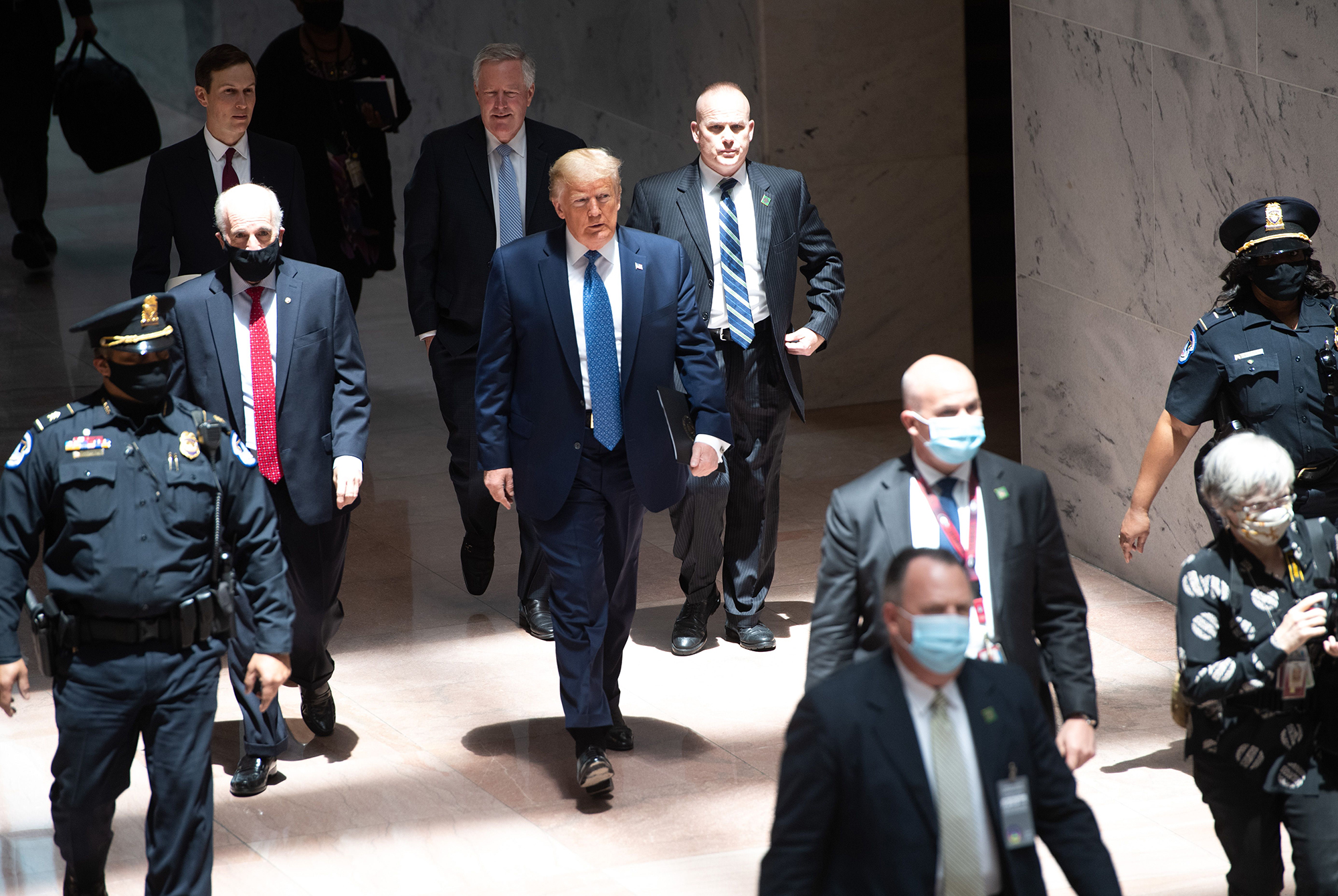 US President Donald Trump arrives for the weekly Senate policy luncheon on Capitol Hill in Washington, DC, on May 19, 2020. 