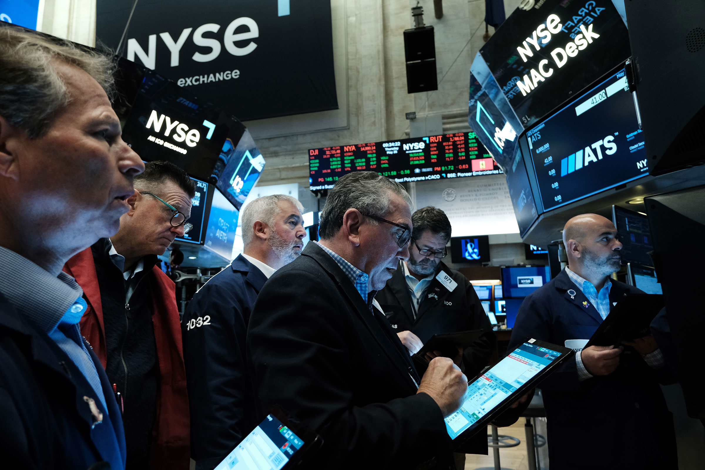 Traders work on the floor of the New York Stock Exchange on May 25, in New York City. 
