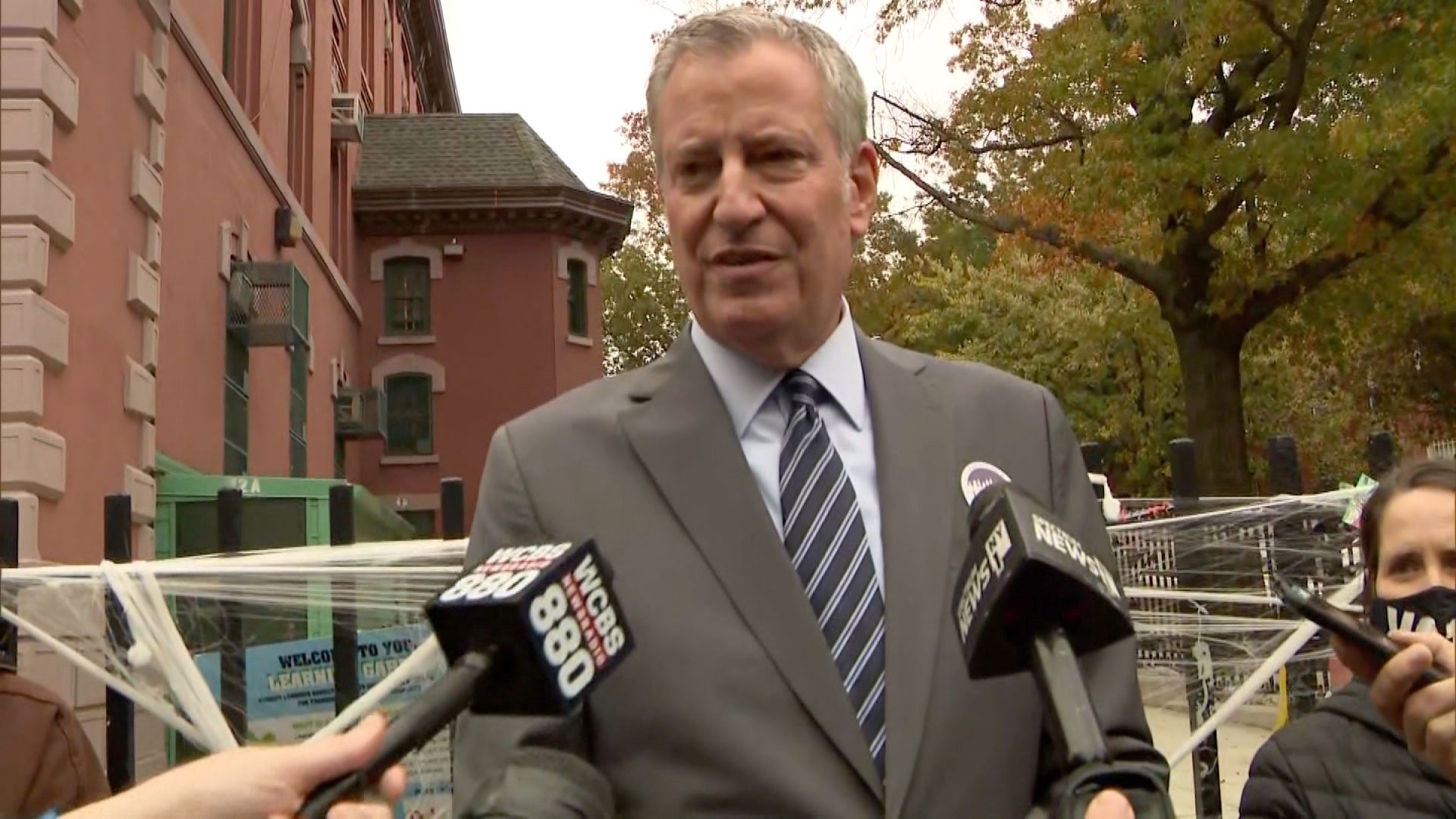 New York Mayor Bill de Blasio talks to reporters on Tuesday.