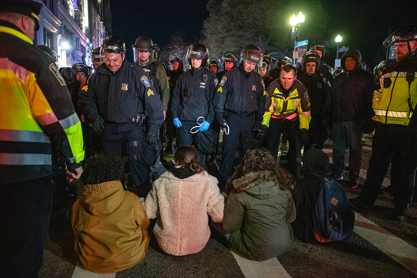 Police move in to arrest pro-Palestinian supporters who were blocking the road after the Emerson College Palestinian protest camp was cleared by police in Boston, Massachusetts, on April 25. 