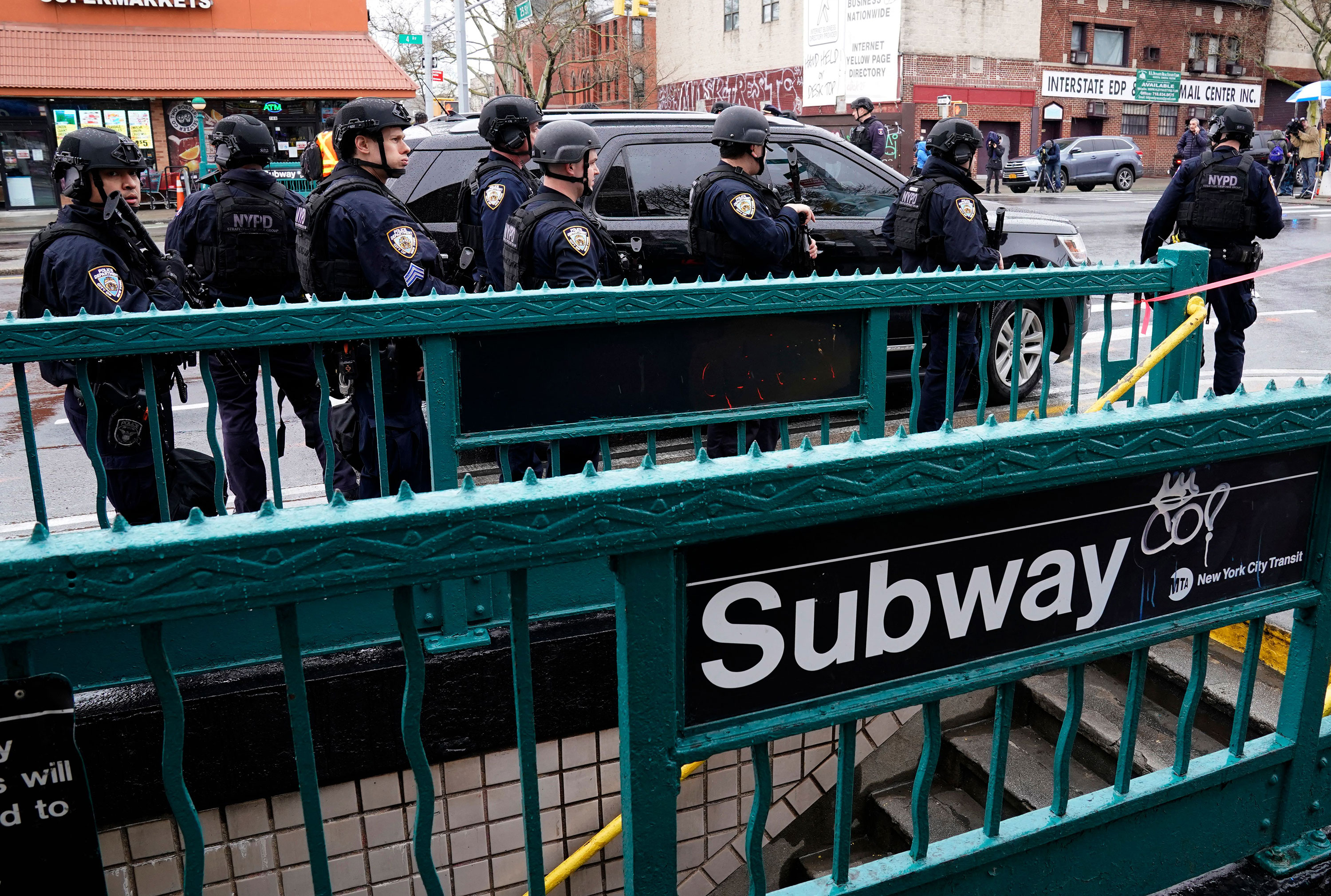 Members of the New York City Police Department patrol the streets after the incident on April 12. 