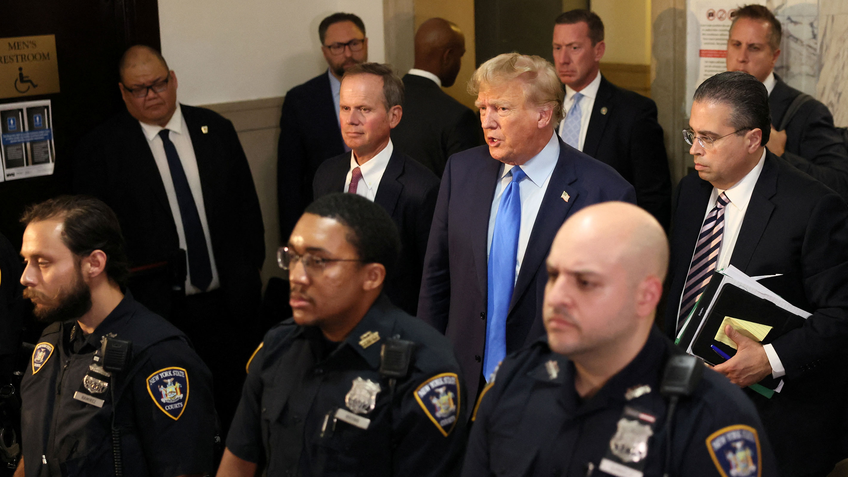 Former President Donald Trump speaks at a Manhattan courthouse, where he attends the trial of himself, his adult sons, the Trump Organization and others in a civil fraud case brought by state Attorney General Letitia James, in New York City, on Monday, October 2, 2023. 