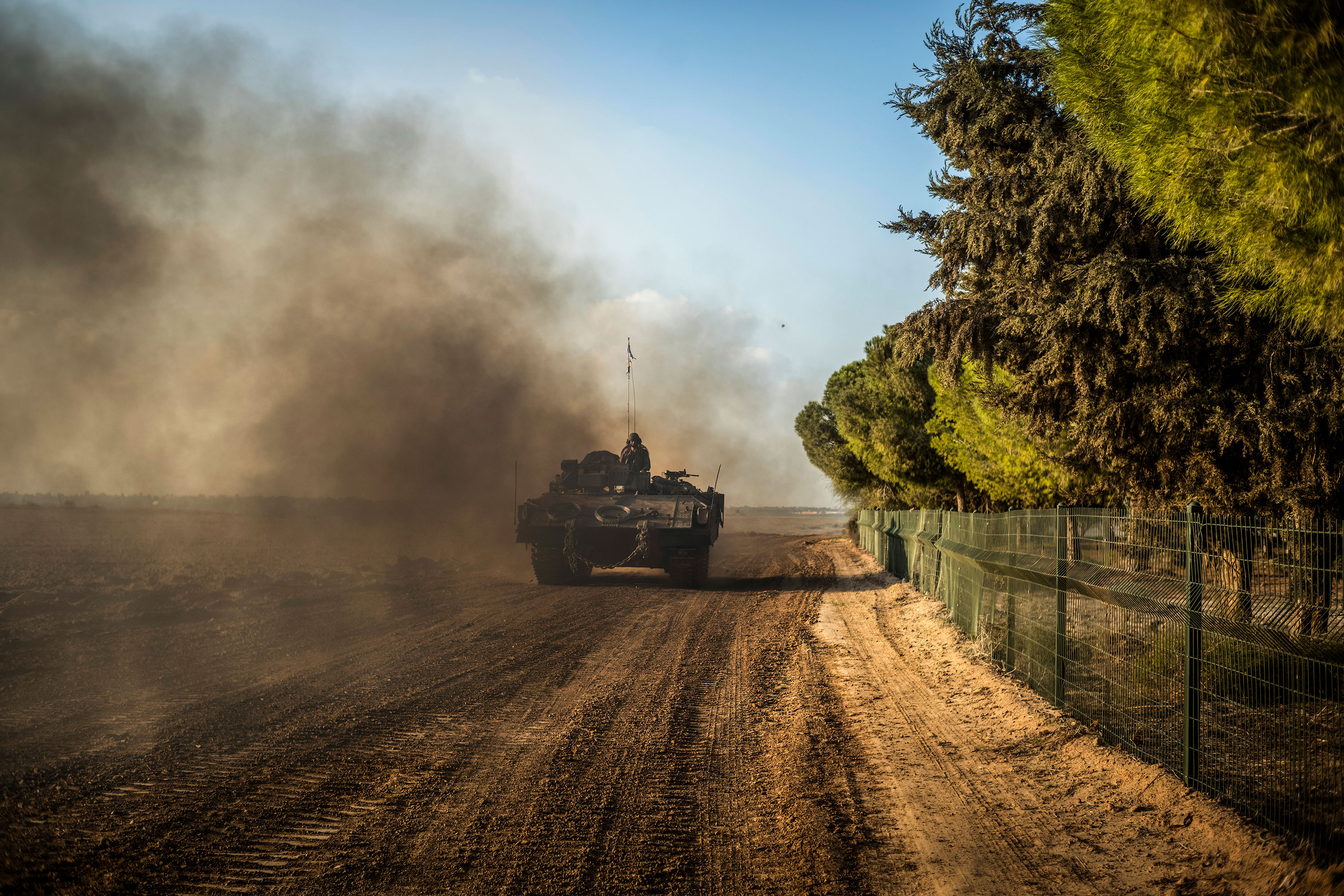An Israeli tank moves near the border with Gaza on Friday, December 1.