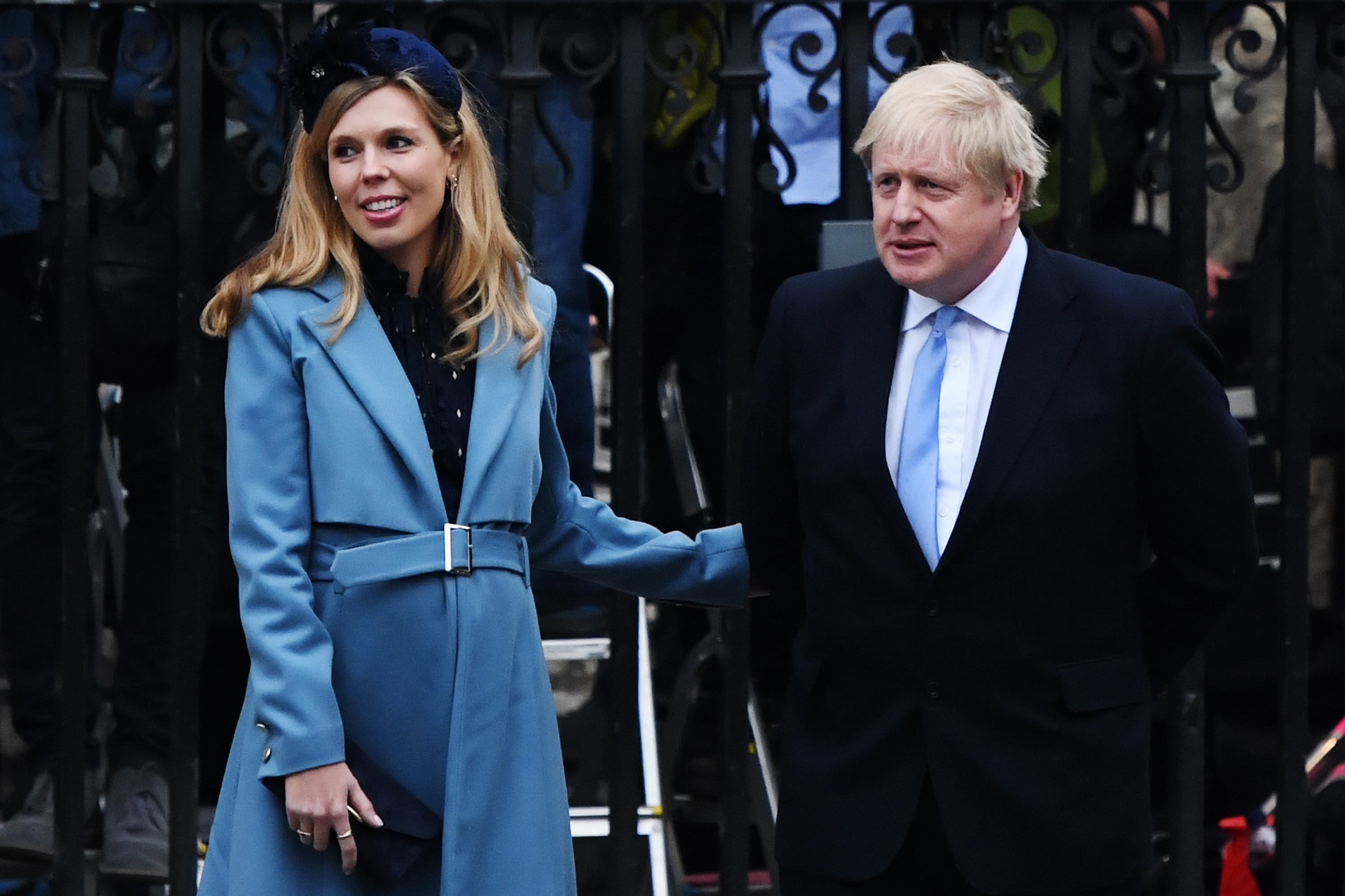 UK Prime Minister Boris Johnson and his fiancee Carrie Symonds leave the Commonwealth Day Service at Westminster Abbey on March 9 in London. 