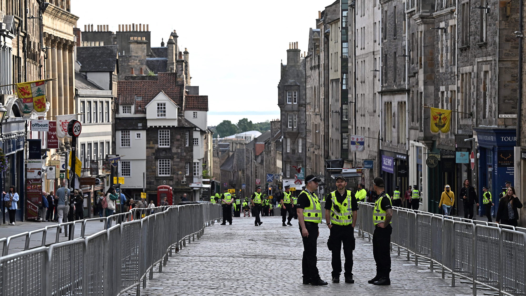Police officers patrol in the streets of Edinburgh, Scotland, on September 11, as preparations are made for the arrival of the coffin of Queen Elizabeth II. 
