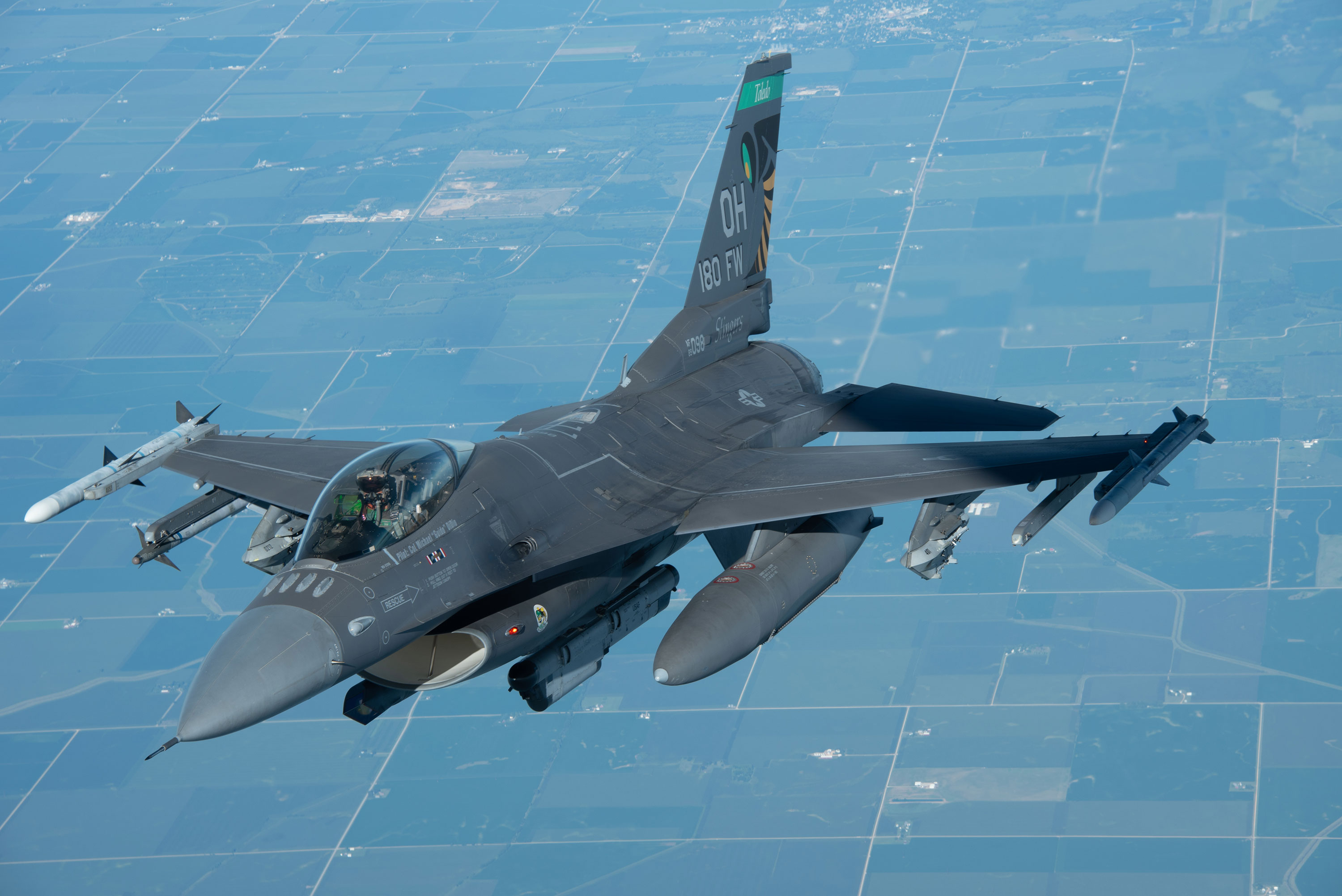 A US Air Force F-16 Fighting Falcon flies over Iowa on August 11, 2022. 