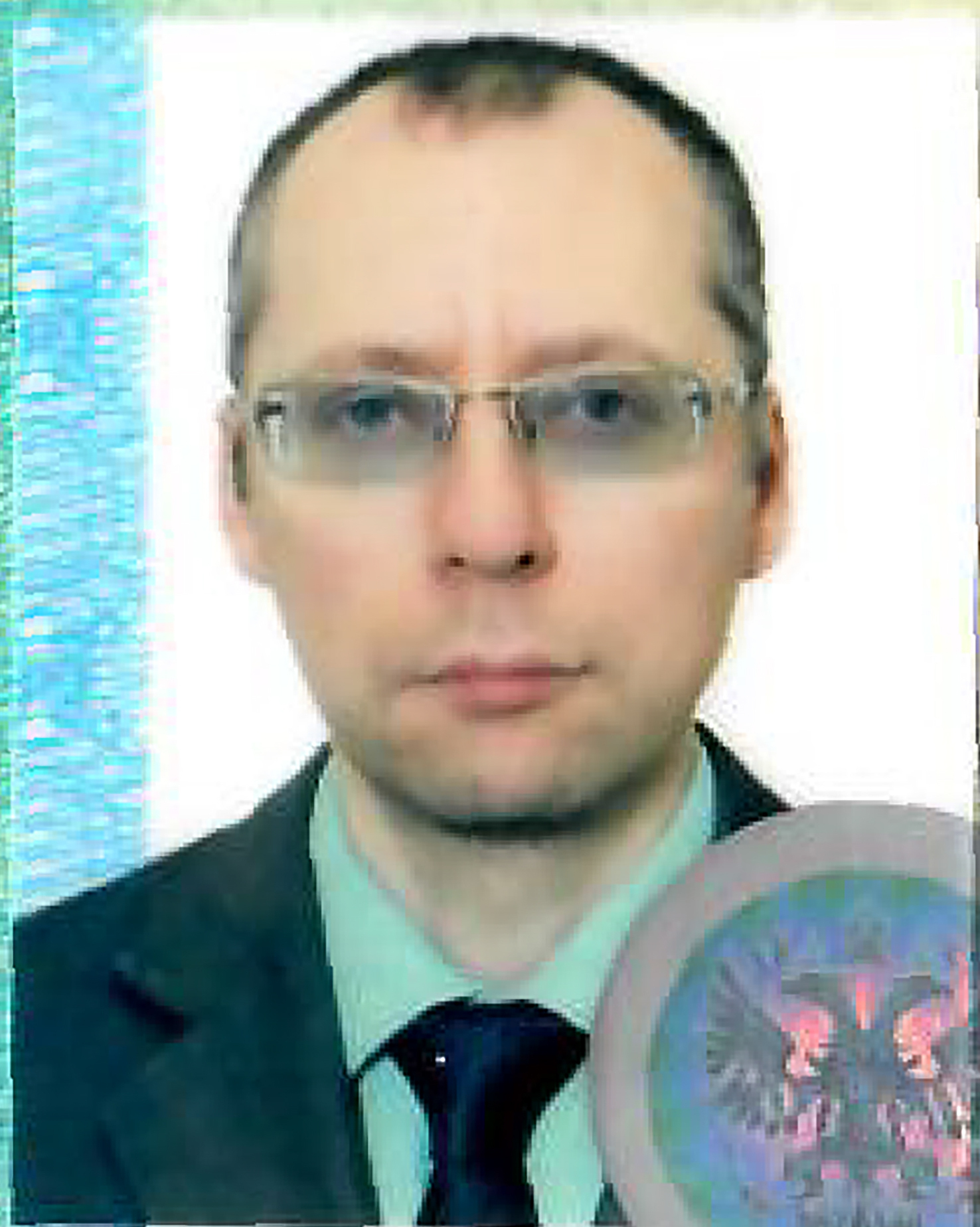 An image taken with permission from the passport photo page of Russian diplomat Boris Bondarev on May 23.