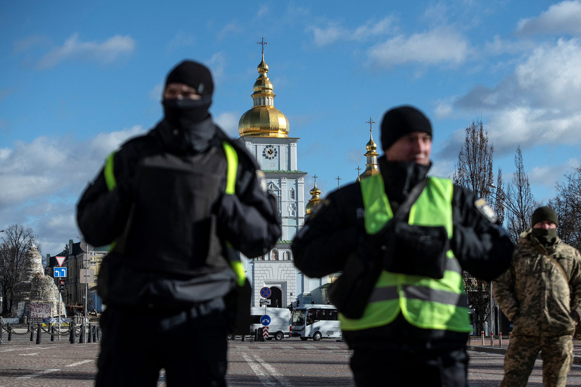 Police officers stand next to Mykhailivska Square in central Kyiv, Ukraine, on February 20.