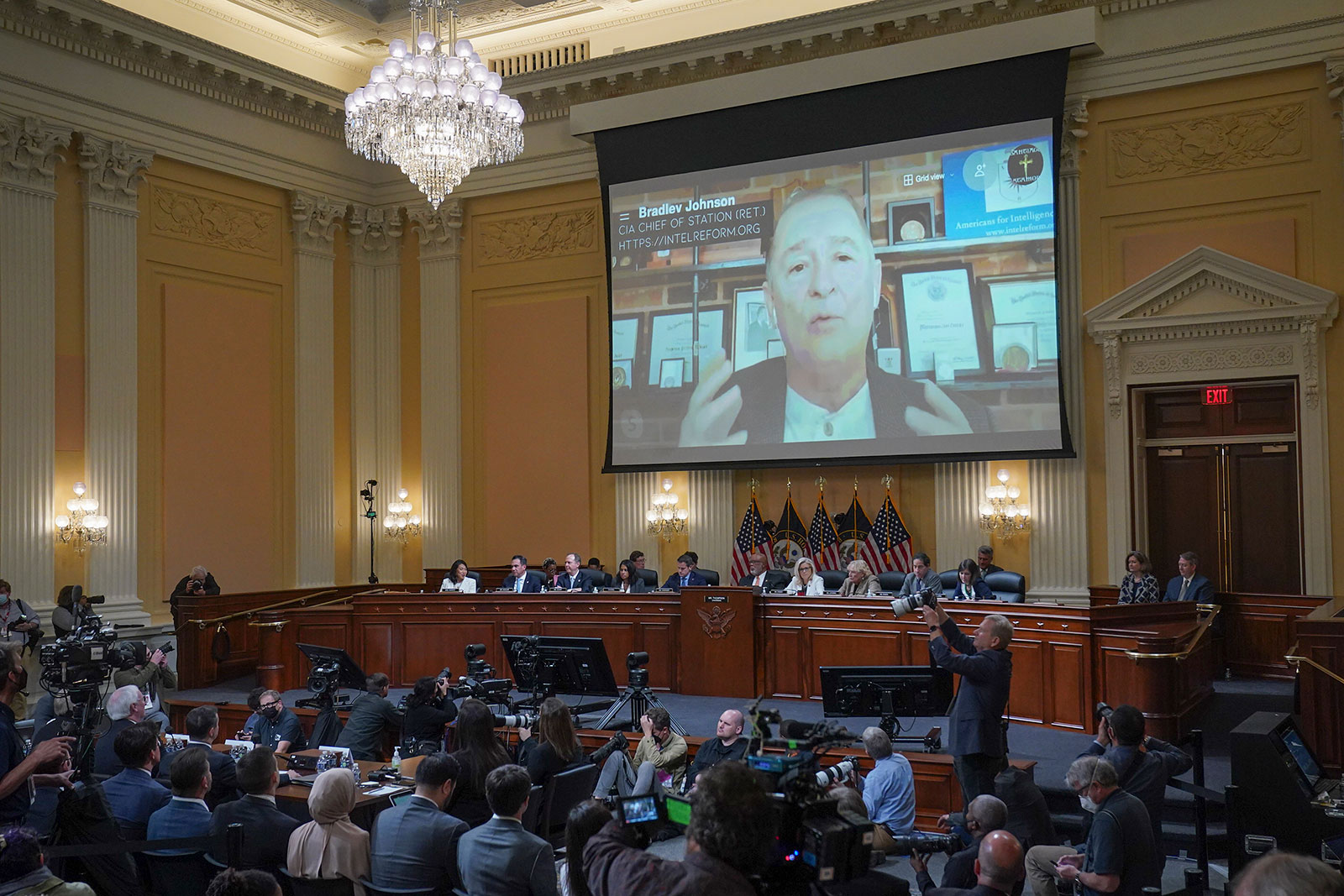 A video of retired CIA chief of station Bradley Johnson is shown on screen during the fifth hearing held by the House select committee on June 23. 