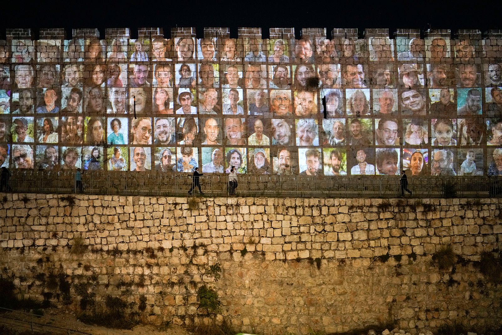 Photos of Israeli hostages being held by Hamas militants are projected onto the walls of Jerusalem's Old City on November 6.