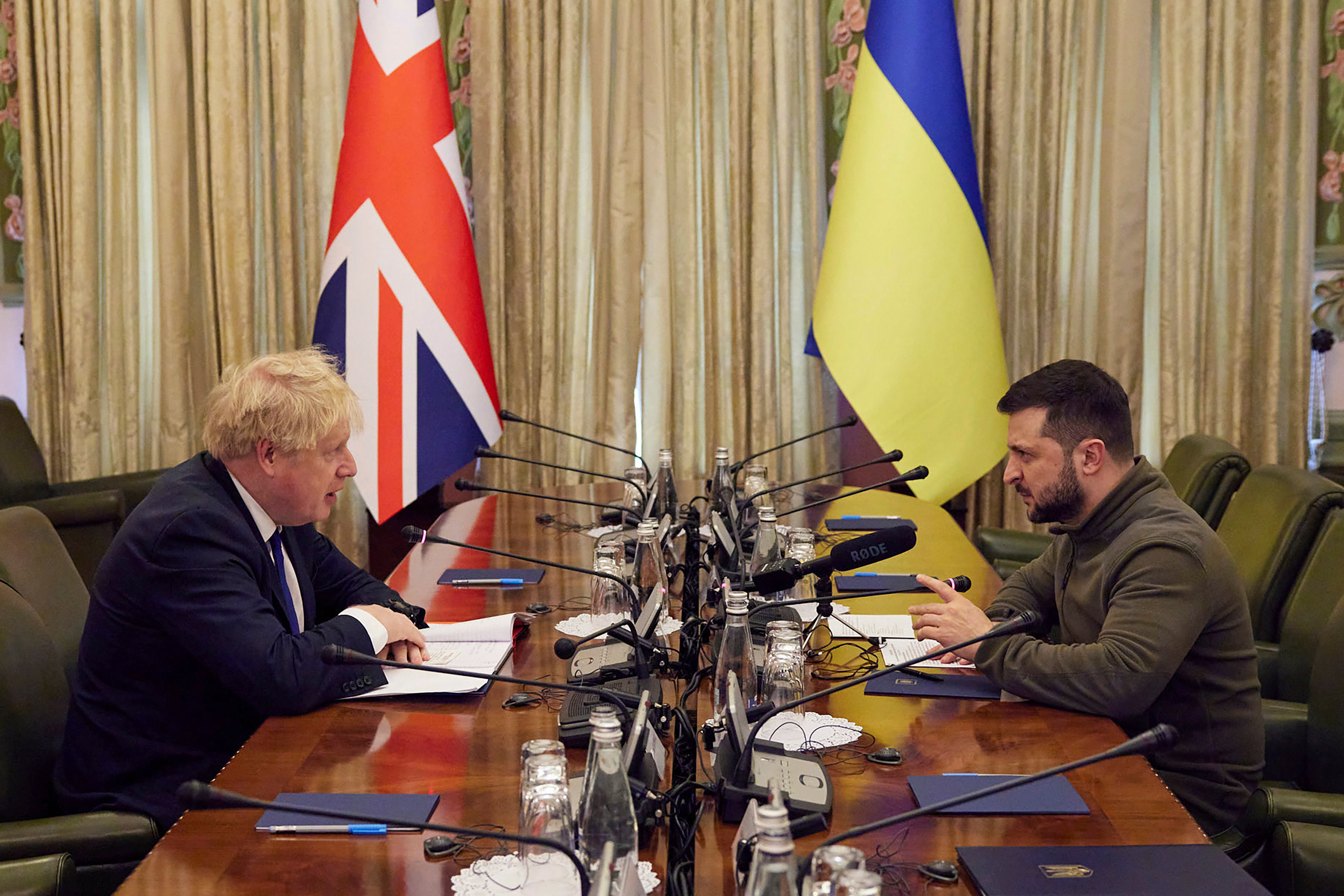 Ukrainian President Volodymyr Zelensky speaks with Britain's Prime Minister Boris Johnson in Kyiv, Ukraine on April 9. 