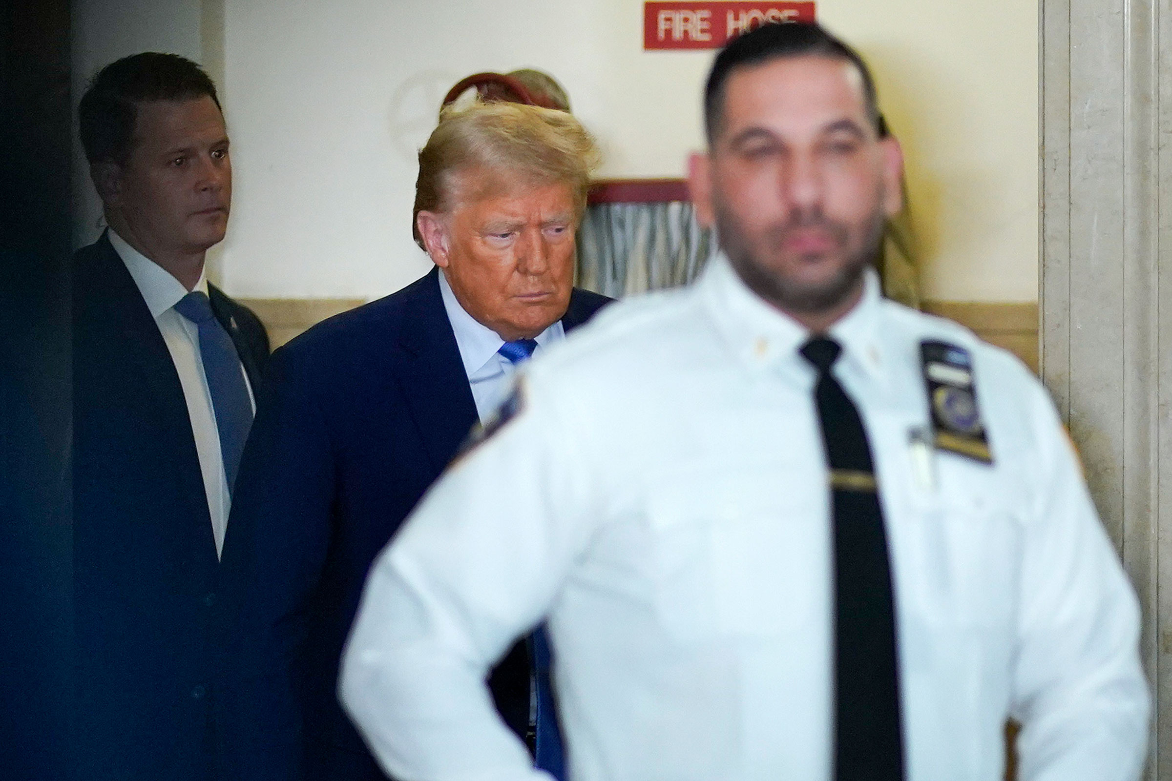 Former President Donald Trump returns to the courtroom after a break in proceedings at New York Supreme Court, Monday, Nov. 6, 2023, in New York.