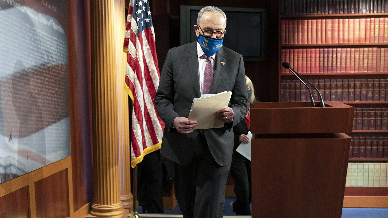 Senate Majority Leader Chuck Schumer arrives to speak to the media on Tuesday, March 2, on Capitol Hill in Washington.