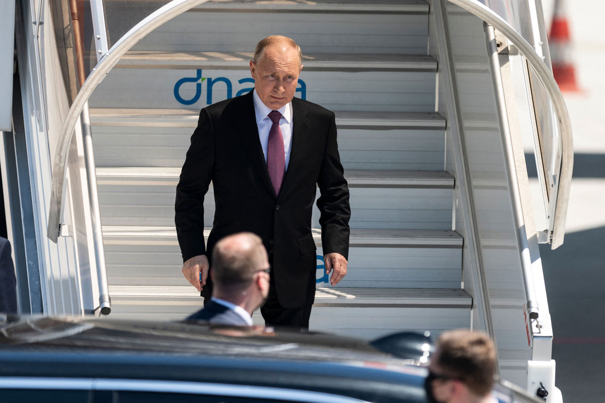 Russian President Vladimir Putin steps down the stairs from his airplane for the US-Russia summit with US President Joe Biden, at the Geneva Airport, on June 16.